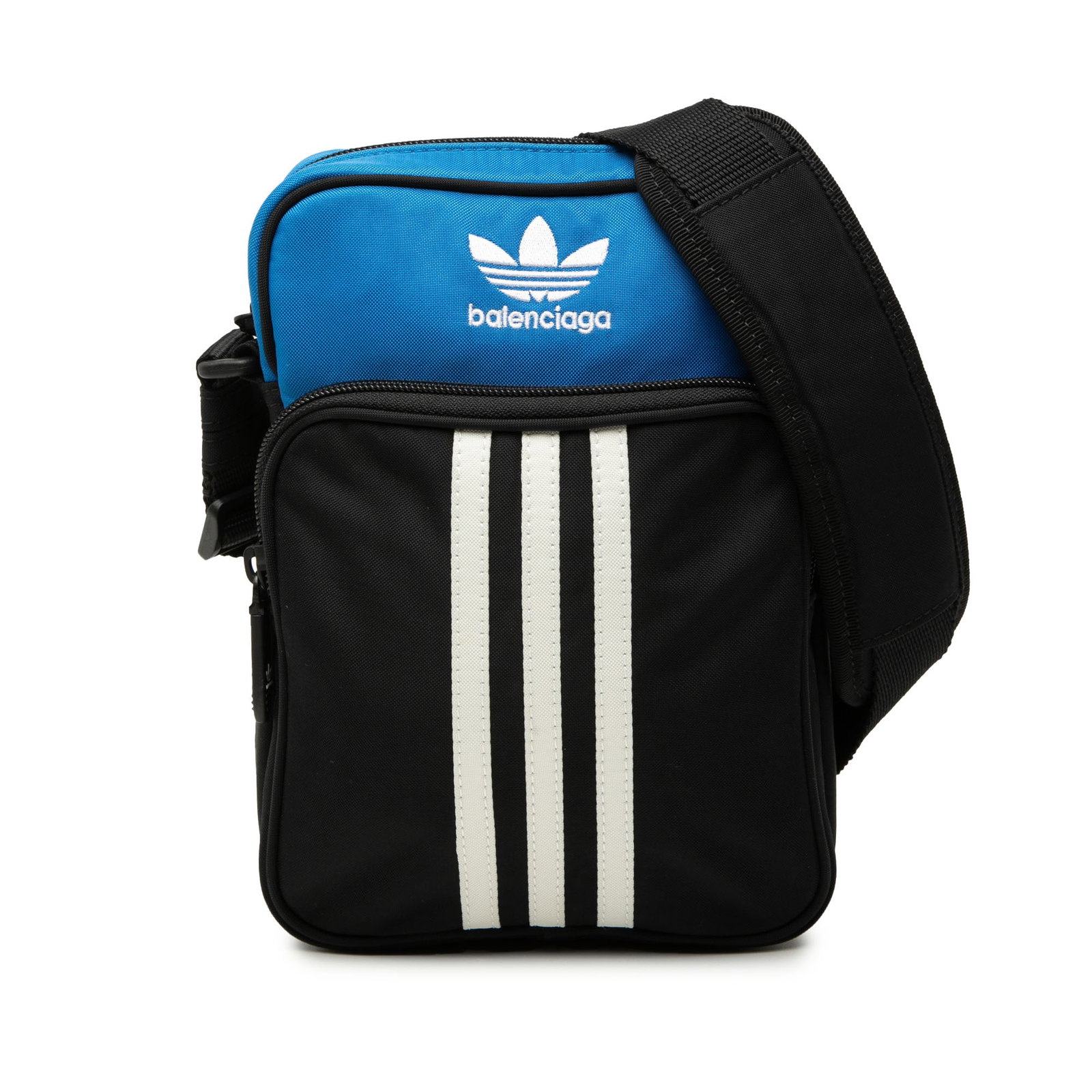 Balenciaga Adidas nylon crossbody messenger bag black: Balenciaga Adidas nylon crossbody messenger bag black Balenciaga Adidas Small Nylon Messenger Bag in black with a compact crossbody design. It features a nylon body, an adjustable flat leather strap, 