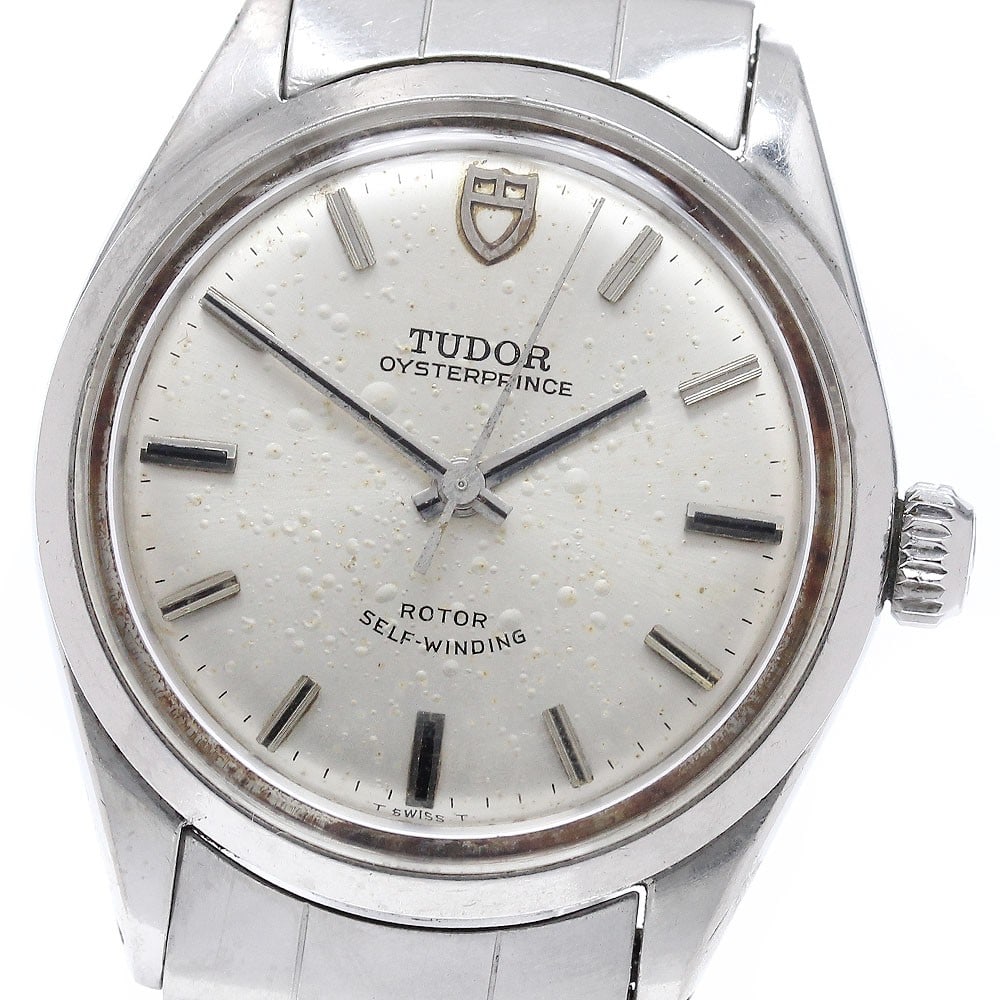 TUDOR Oyster Prince 7969 0 Cal 2483 Automatic Wristwatch: TUDOR Oyster Prince 7969 0 Cal 2483 Automatic Wristwatch TUDOR Oyster Prince automatic wristwatch, reference 7969/0, with a Swiss origin and stainless steel case and bracelet. It features a silver dia
