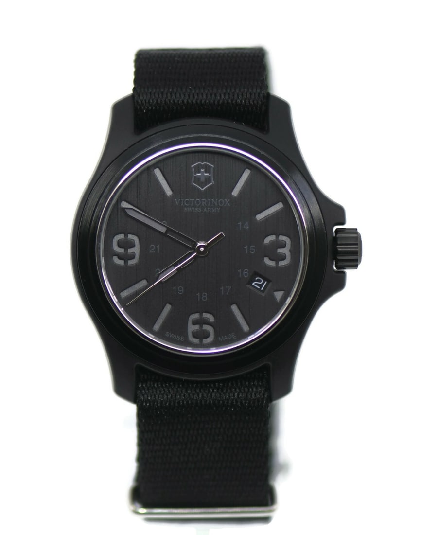 Victorinox Swiss Army Black Watch 40mm Model 241517 with Box and Papers: Victorinox Swiss Army Black Watch 40mm Model 241517 with Box and Papers The Victorinox Swiss Army Black Watch 241517 is a stylish wristwatch that combines functionality with elegance. Featuring a slee