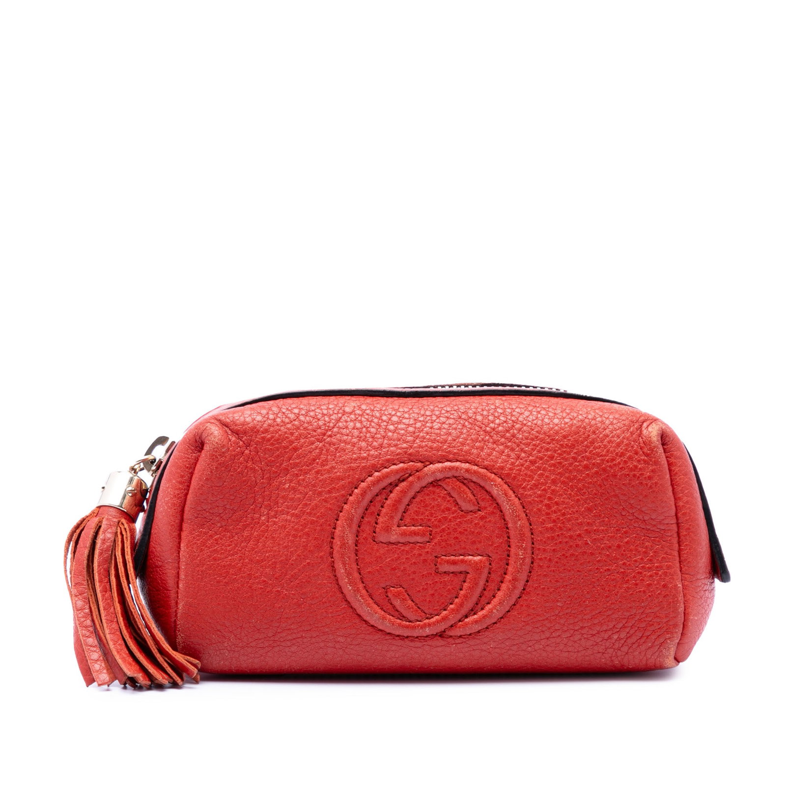 Gucci Soho Pebbled Calf Leather Cosmetic Case Red: Gucci Soho Pebbled Calf Leather Cosmetic Case Red This Gucci Soho cosmetic pouch is crafted from pebbled calf leather and features a top zip closure with a leather tassel pull. The pouch shows overall