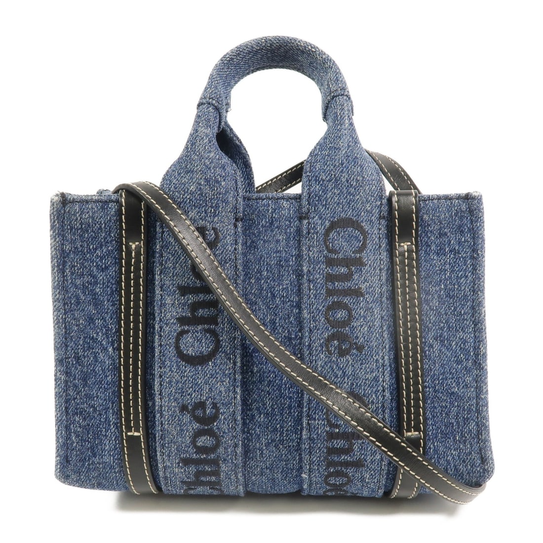 Chloe Woody Mini Denim Tote Shoulder Bag Blue 2 Way: Chloe Woody Mini Denim Tote Shoulder Bag Blue 2 Way CHLOE Woody Tote Mini 2 Way Shoulder Bag in blue denim. This mini tote features a 2-way design with a handle drop of 21 cm and a shoulder strap leng