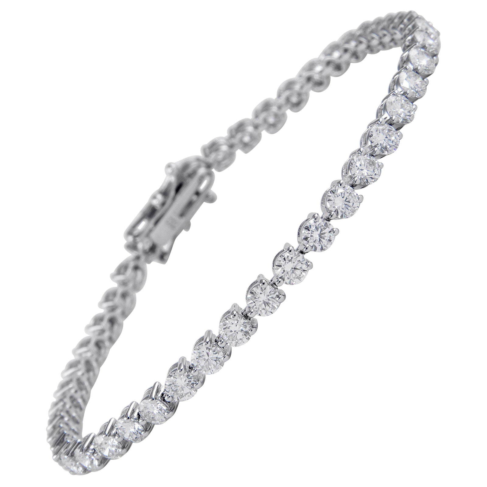 5.90ct Diamond Tennis Bracelet 18k White Gold: 5.90ct Diamond Tennis Bracelet 18k White Gold This exquisite tennis bracelet features 45 round brilliant diamonds totaling 5.90 carats, set in stunning 18k white gold. The diamonds showcase approximat