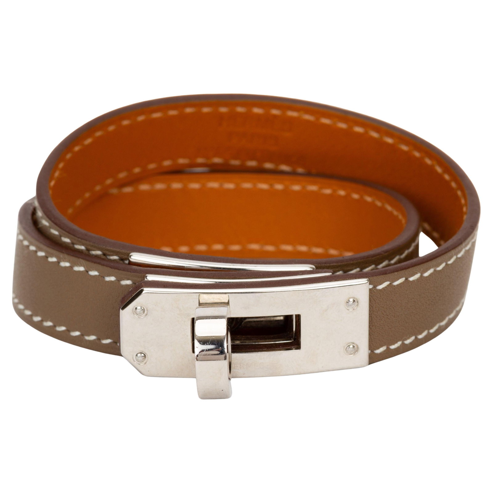 Hermes Kelly Double Tour Etoupe Leather Wrap Bracelet with Palladium Closure: Hermes Kelly Double Tour Etoupe Leather Wrap Bracelet with Palladium Closure The Hermes Swift Kelly Double Tour Bracelet in Etoupe features a supple leather band designed to wrap around the wrist twic