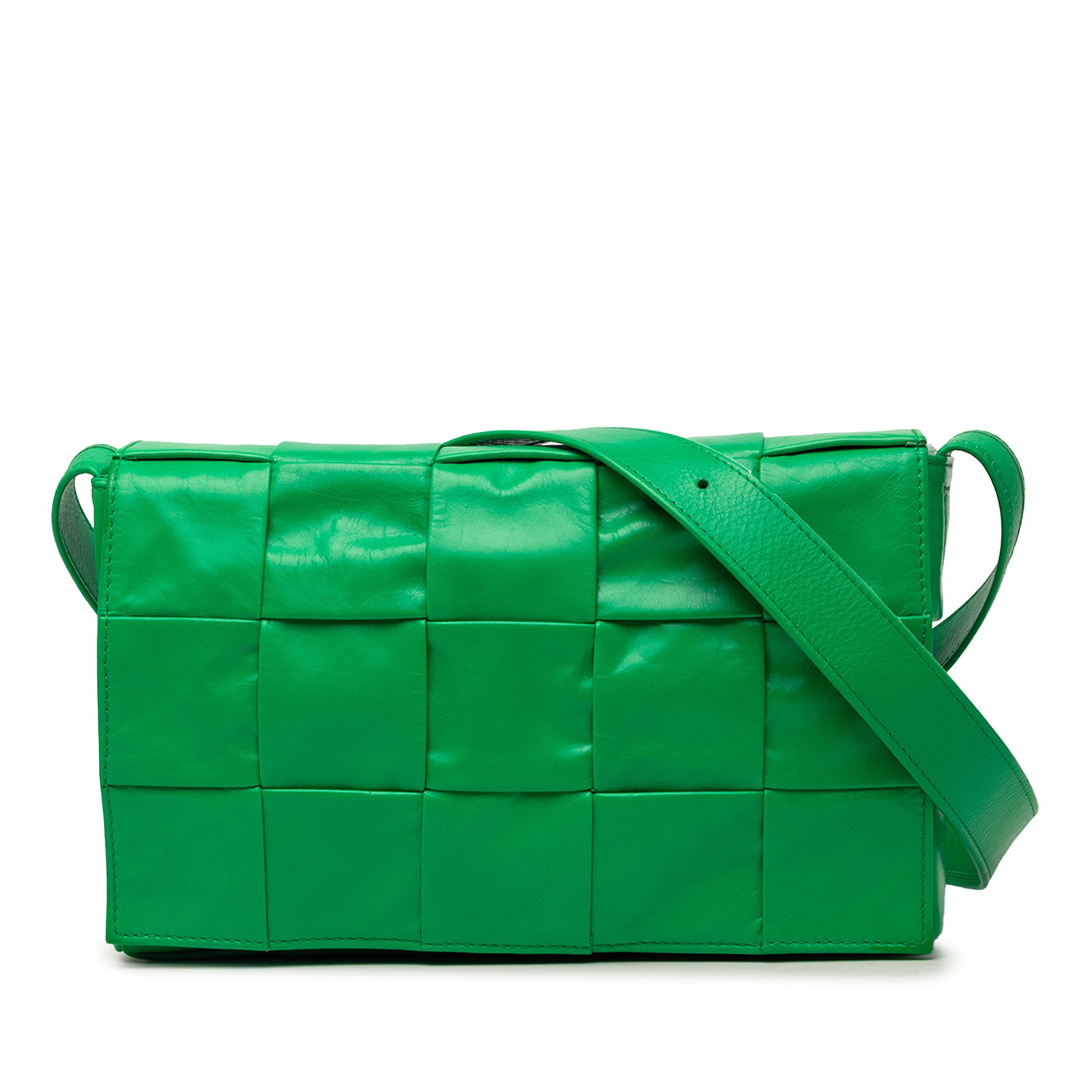 Bottega Veneta Intrecciato Cassette Small Green Leather Crossbody Bag: Bottega Veneta Intrecciato Cassette Small Green Leather Crossbody Bag Small Bottega Veneta Cassette crossbody bag in green paper calfskin leather with the signature Intrecciato woven body. It features