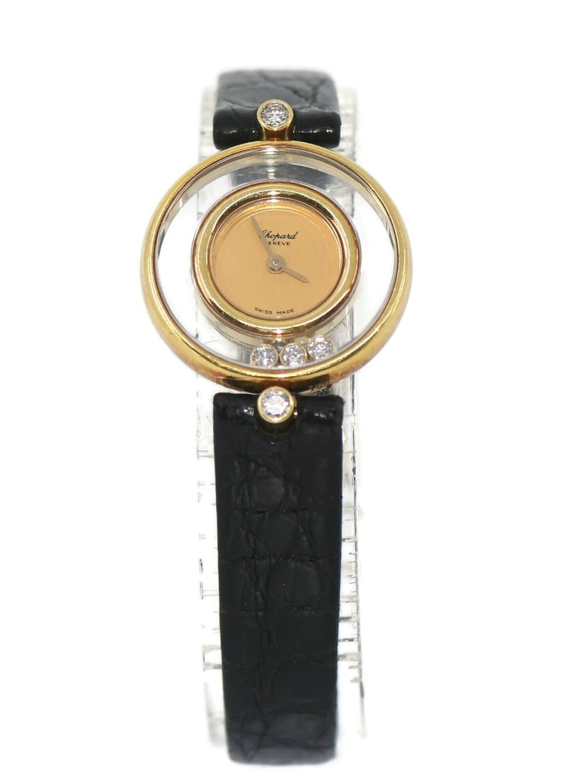 Chopard Happy Diamonds 18K Yellow Gold Watch Ref 20/4802 with Diamond Bezel: Chopard Happy Diamonds 18K Yellow Gold Watch Ref 20/4802 with Diamond Bezel This Chopard Happy Diamonds wristwatch combines elegance and luxury, featuring a stunning 18K yellow gold case with a diamon