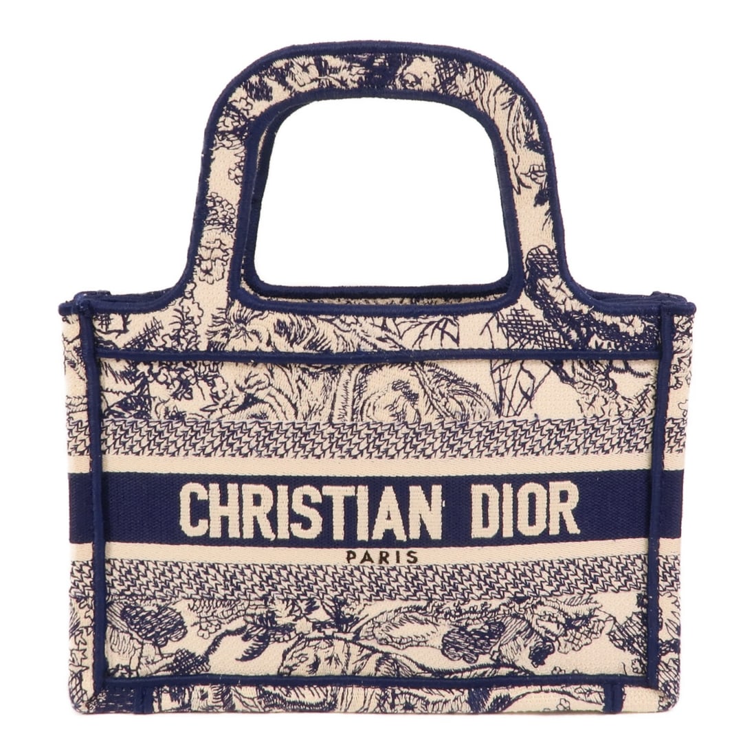 Dior Mini Book Tote Canvas Handbag Blue White CD S5573CRGO_M928: Dior Mini Book Tote Canvas Handbag Blue White CD S5573CRGO_M928 This Christian Dior CD Mini Dior Book Tote Bag is crafted in canvas and presented in a blue and white colorway. It is a hand bag style w