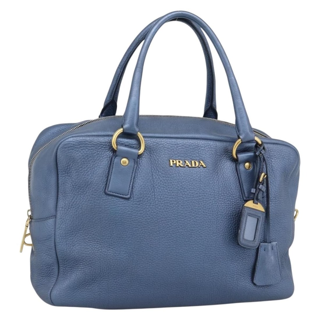 PRADA Blue Leather Handbag with Dust Bag Padlock Keys: PRADA Blue Leather Handbag with Dust Bag Padlock Keys Prada women's hand bag in blue and gold leather, made in Italy. It comes with a dust bag, padlock, two keys, clochette, and name tag. Condition is
