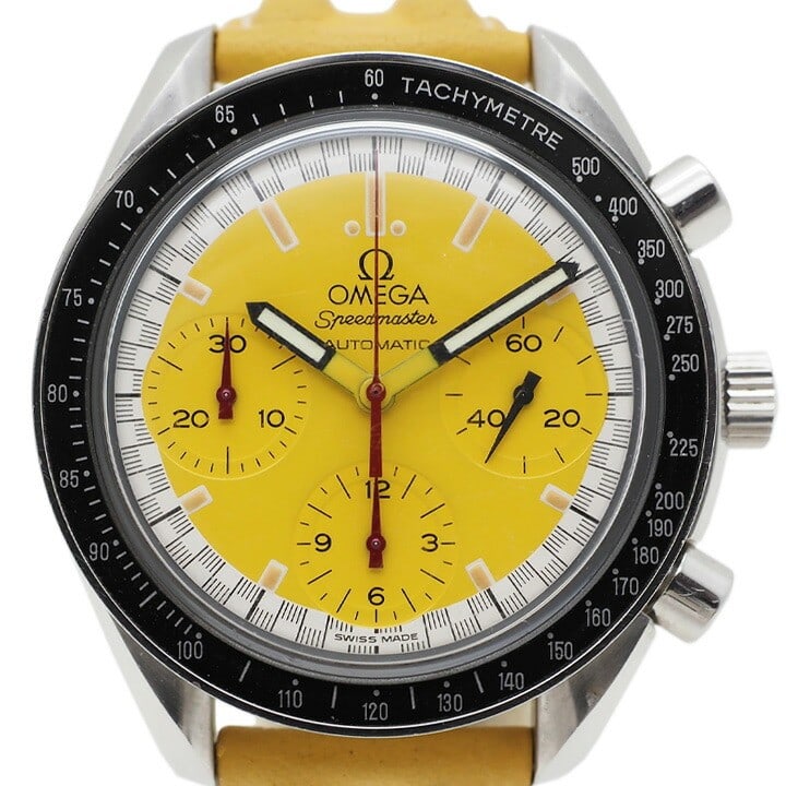 Omega Schumacher Limited Edition Speedmaster Racing Chronograph 3810.12.40: Omega Schumacher Limited Edition Speedmaster Racing Chronograph 3810.12.40 This OMEGA Speedmaster Racing Schumacher Limited Edition 3810.12.40 men's wristwatch features a stainless steel case with a d