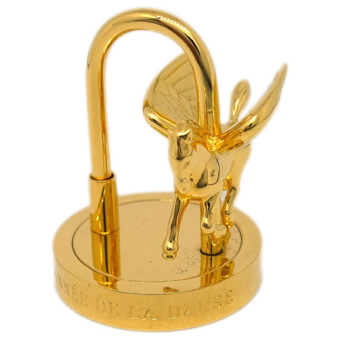 Hermes Entrez dans la danse Pegasus Cadena Charm 2007 Gold: Hermes Entrez dans la danse Pegasus Cadena Charm 2007 Gold Vintage Hermes Pegasus Cadena bag charm from 2007 featuring the Entrez dans la danse! motif. This unisex gold-plated charm is made in France 
