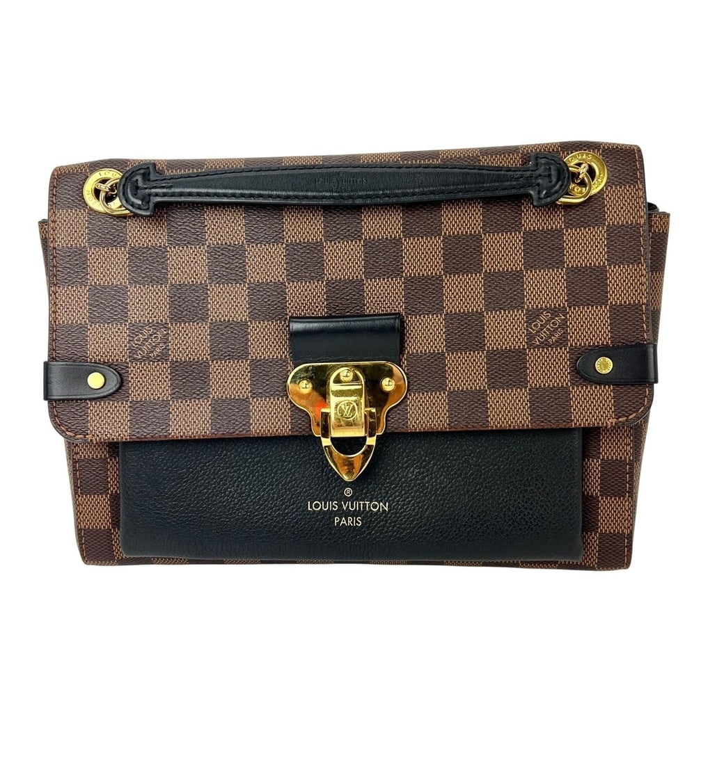 Louis Vuitton Vavin PM small Damier Ebene crossbody purse: Louis Vuitton Vavin PM small Damier Ebene crossbody purse Pre-owned Louis Vuitton Vavin PM crossbody bag in the Damier Ebene pattern. This small rectangular bag features a magnetic closure, brown coat