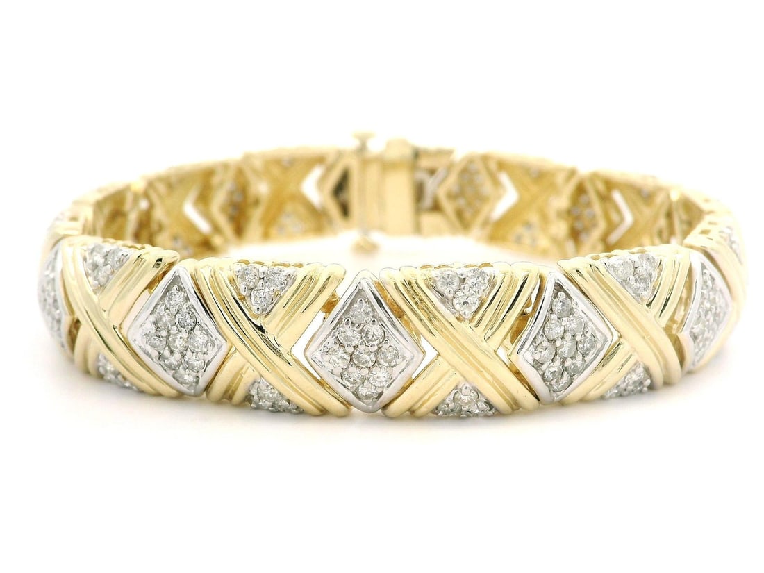 14k Yellow White Gold 2.9ct Diamond Grooved X Link Bracelet: 14k Yellow White Gold 2.9ct Diamond Grooved X Link Bracelet This stunning bracelet showcases a beautiful combination of 14k yellow and white gold, featuring a wide grooved X link geometric design. Acc