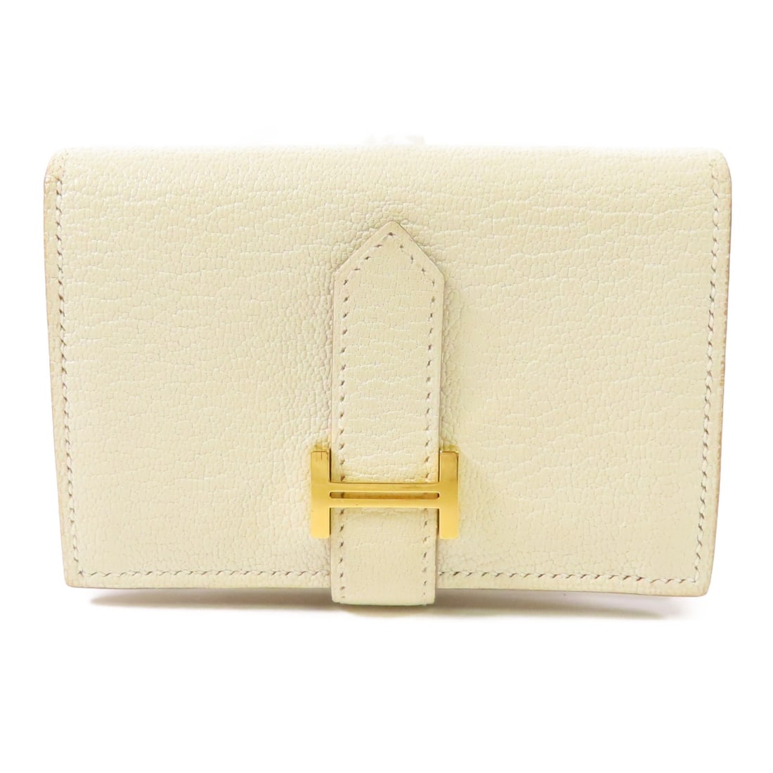 Hermes Mini Bearn Bifold Wallet Chevre Goatskin Mushroom White: Hermes Mini Bearn Bifold Wallet Chevre Goatskin Mushroom White Hermes Mini Bearn bi-fold wallet in mushroom white, made from Chevre and goatskin leather with gold-tone hardware. It features a button p