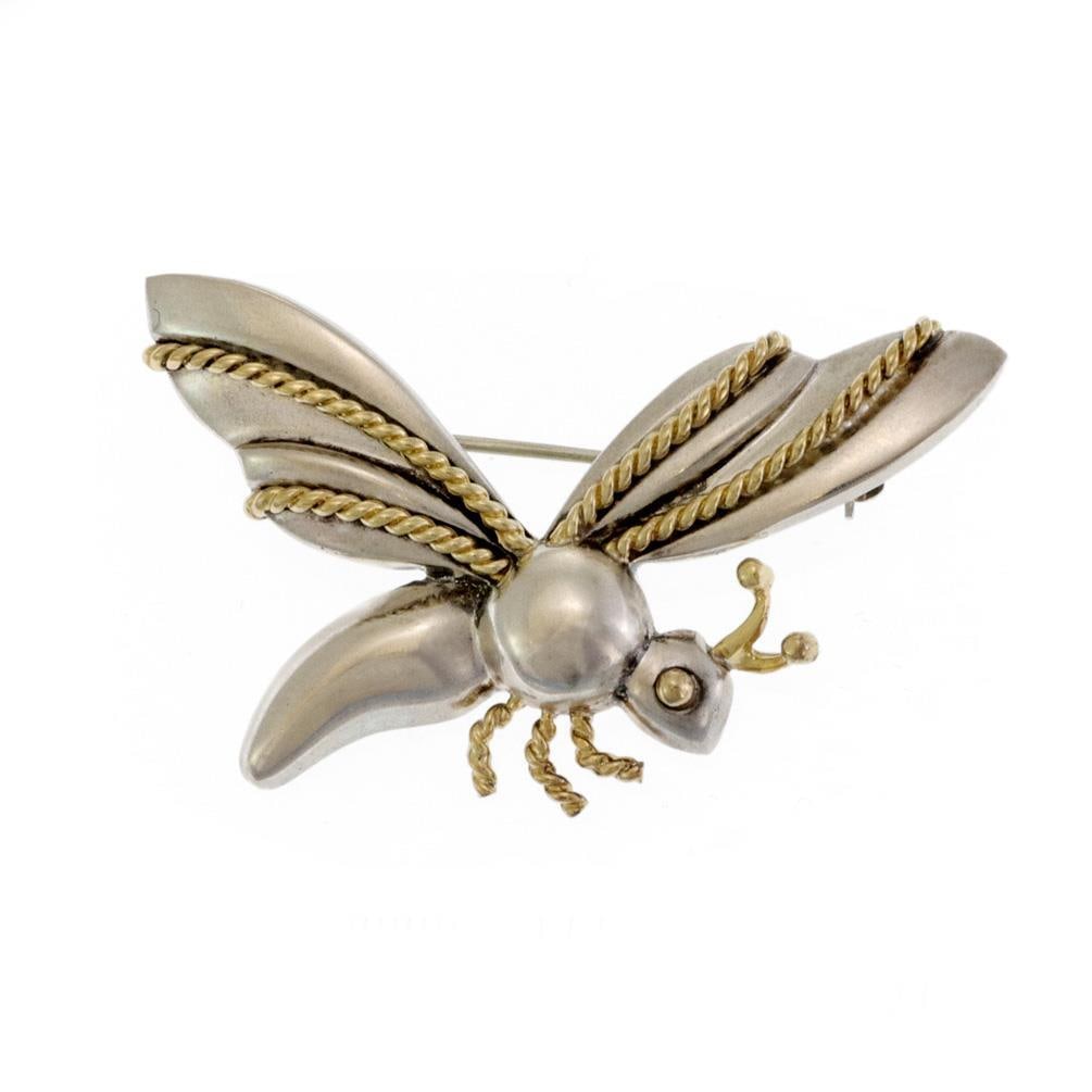 Tiffany Co Sterling Silver 18k Yellow Gold Butterfly Brooch: Tiffany Co Sterling Silver 18k Yellow Gold Butterfly Brooch This vintage brooch from Tiffany & Co. is expertly crafted in sterling silver with 18k yellow gold accents. The design features a butterfly 