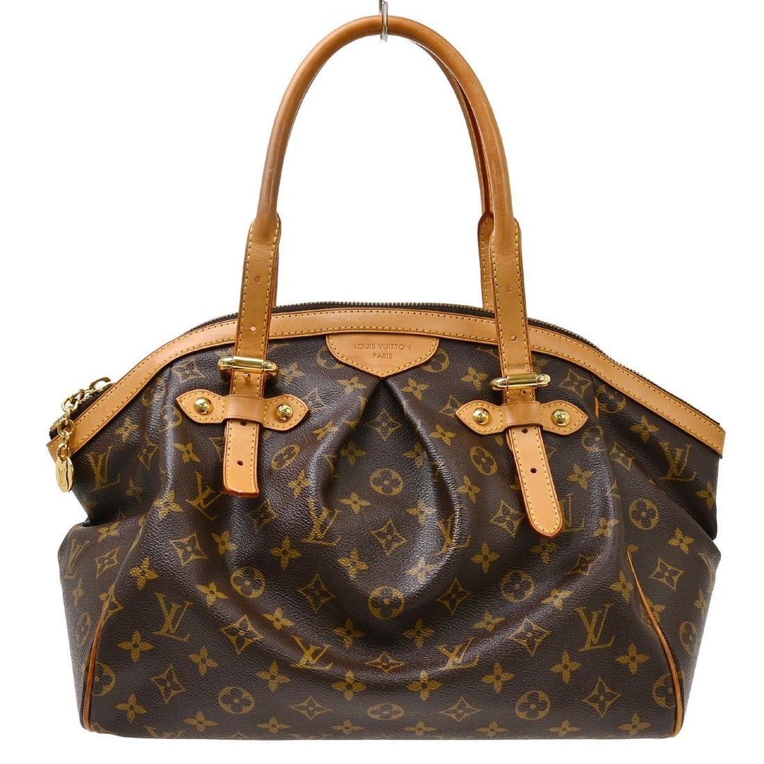 Louis Vuitton Tivoli GM Monogram Canvas Tote Bag M40144: Louis Vuitton Tivoli GM Monogram Canvas Tote Bag M40144 Louis Vuitton Monogram Tivoli GM handbag in brown Monogram Canvas and leather, styled as a large tote with a zip closure and bottom studs. It fe