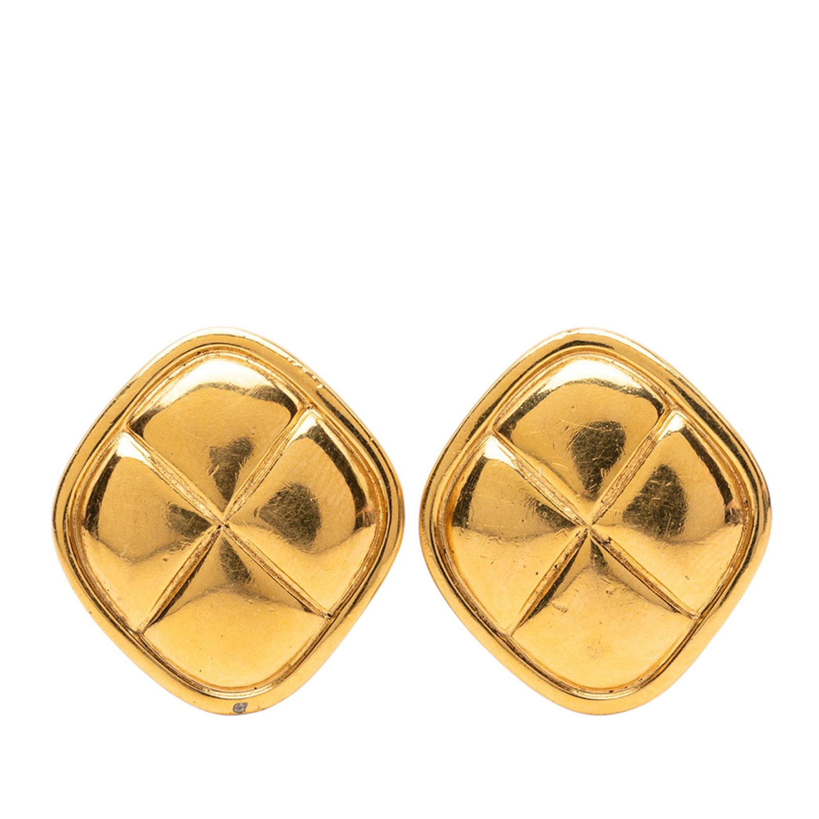Chanel Rhombus Clip On Earrings Gold Plated Quilted Metal: Chanel Rhombus Clip On Earrings Gold Plated Quilted Metal Clip-on rhombus earrings with a quilted design and gold plated metal construction. This costume jewelry pair is made in France and shows wear 