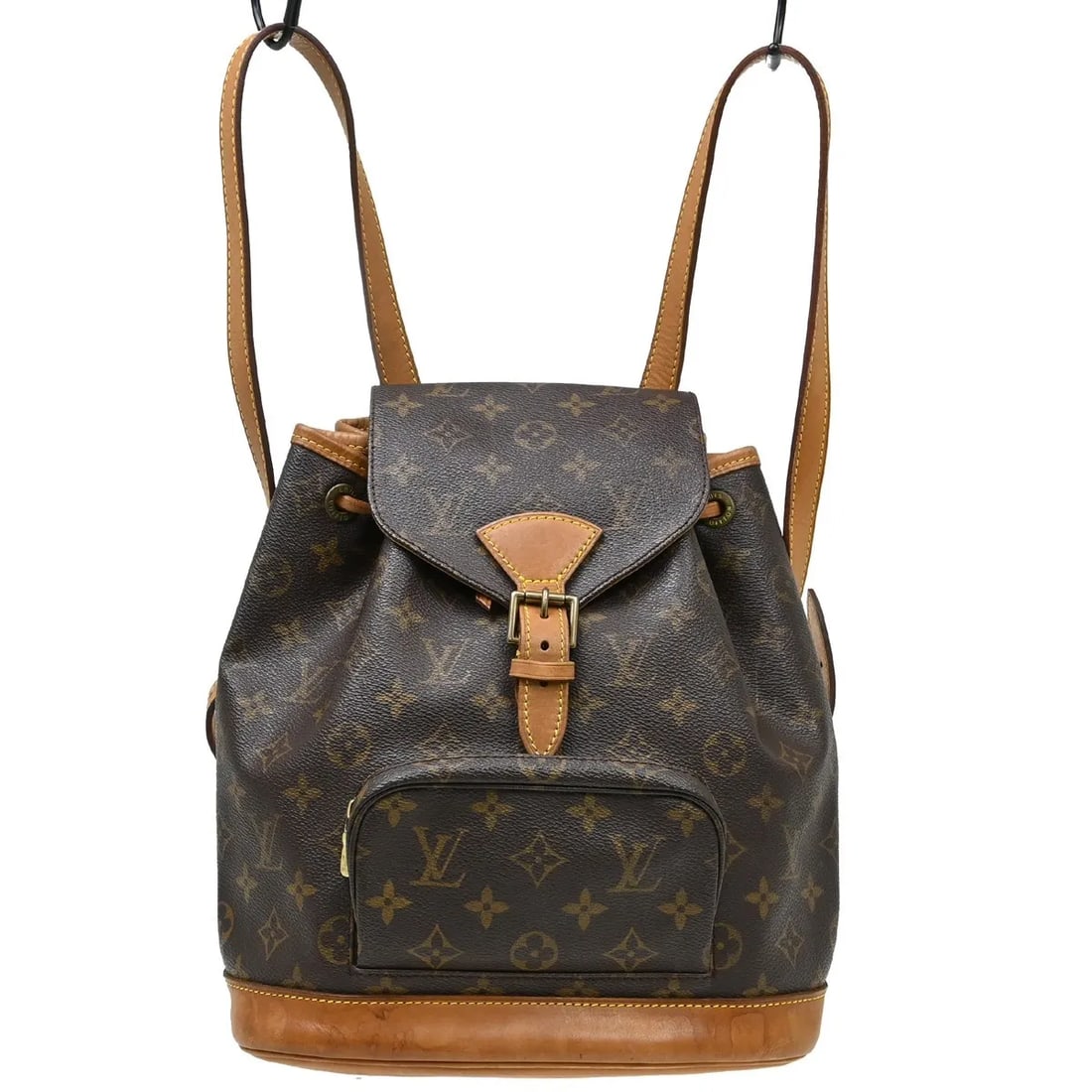 Louis Vuitton Montsouris brown monogram canvas bag: Louis Vuitton Montsouris brown monogram canvas bag Louis Vuitton Montsouris backpack in brown monogram canvas. This unisex piece is made in France and is presented in fair condition with visible wear,