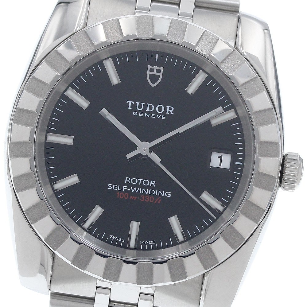 TUDOR Classic 21010 Mens Automatic Date Wristwatch: TUDOR Classic 21010 Mens Automatic Date Wristwatch TUDOR Classic Date automatic men's wristwatch, pre-owned and offered as watch only. It features a stainless steel case and bracelet, black dial, date