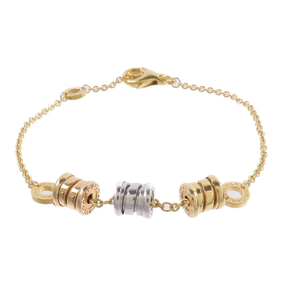 BVLGARI B zero 1 Three Element Bracelet 18K Tri Color Gold: BVLGARI B zero 1 Three Element Bracelet 18K Tri Color Gold A BVLGARI B.zero1 three-element bracelet crafted in 18K yellow gold, white gold, and pink gold. The piece is presented in a gold and silver c