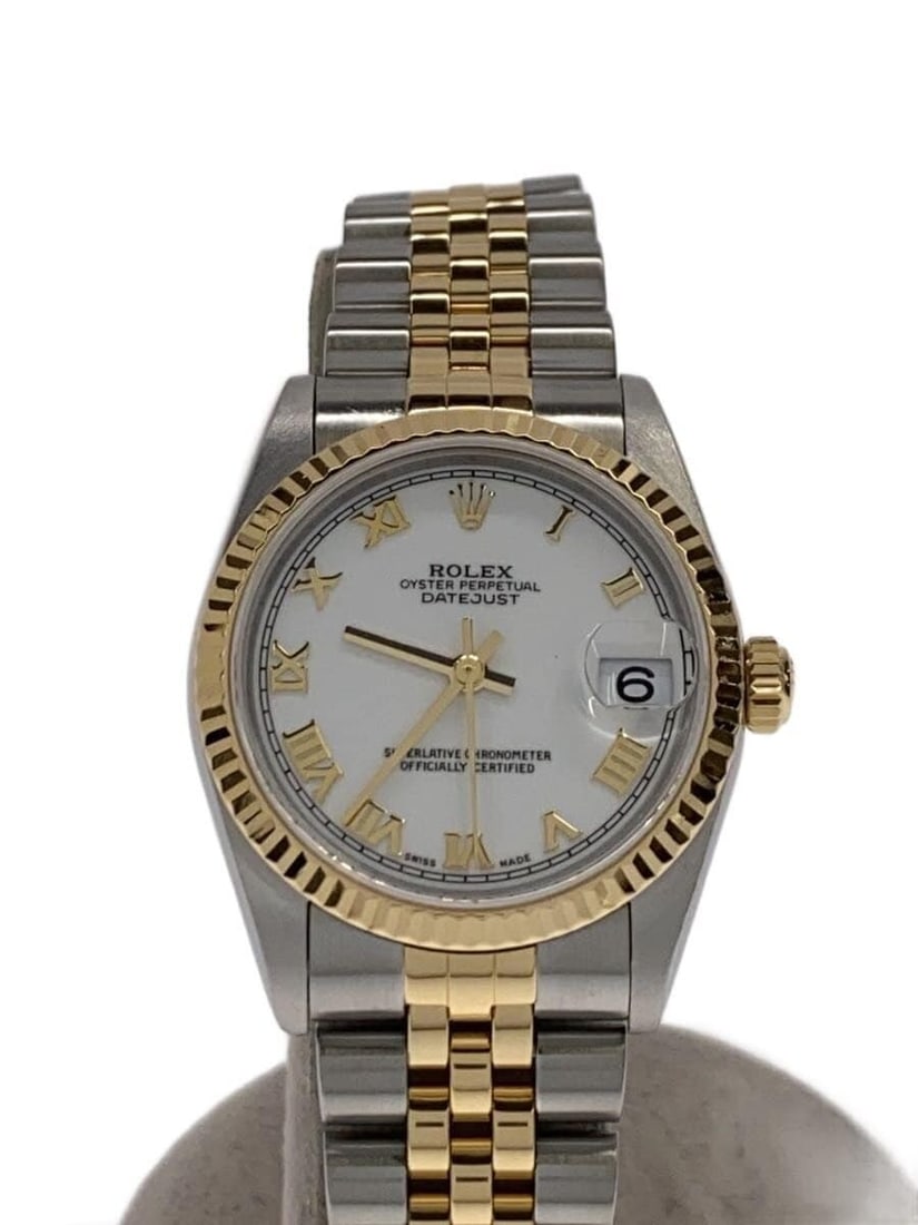 Rolex Datejust Swiss men's wristwatch white dial: Rolex Datejust Swiss men's wristwatch white dial This ROLEX Datejust men's wristwatch is a Swiss-made timepiece featuring a white dial and a stainless steel case. The watch is pre-owned and graded as 