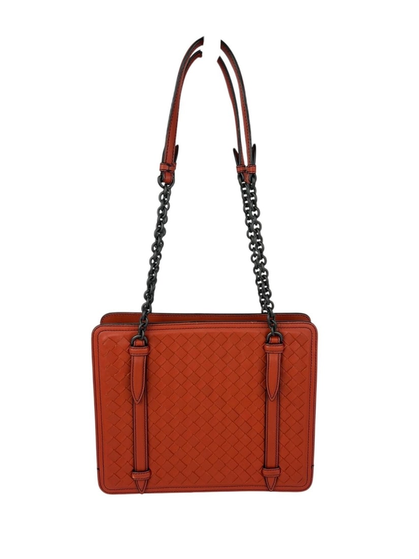 Bottega Veneta Expandable Intrecciato Nappa Leather Shoulder Bag: Bottega Veneta Expandable Intrecciato Nappa Leather Shoulder Bag Bottega Veneta shoulder bag in the Intrecciato pattern, designed in orange leather with a matte finish. It features a magnetic closure,