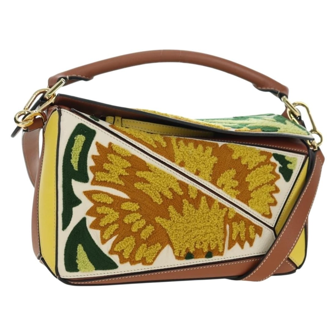 LOEWE Small Puzzle Leather Hand Bag Brown Gold with Strap: LOEWE Small Puzzle Leather Hand Bag Brown Gold with Strap This LOEWE small handbag is crafted from leather in a brown and gold color combination. It is a Puzzle Bag / Hammock style handbag made in Spa