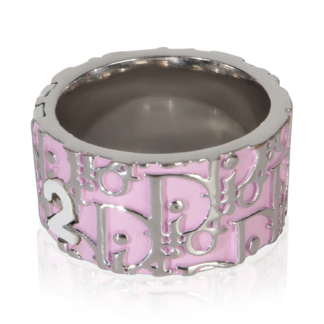 Christian Dior Enamel Oblique Trotter Palladium Plated Ring Size 6: Christian Dior Enamel Oblique Trotter Palladium Plated Ring Size 6 This Christian Dior Enamel Oblique Trotter ring features a palladium-plated base metal and is designed for women. The ring does not c