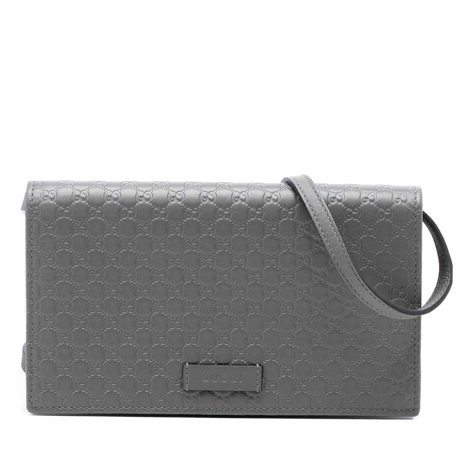 Gucci Microguccissima crossbody leather wallet strap: Gucci Microguccissima crossbody leather wallet strap This Gucci Microguccissima Wallet on Strap is crafted from embossed leather in a sleek gray tone. Designed for versatility, it features a detachabl