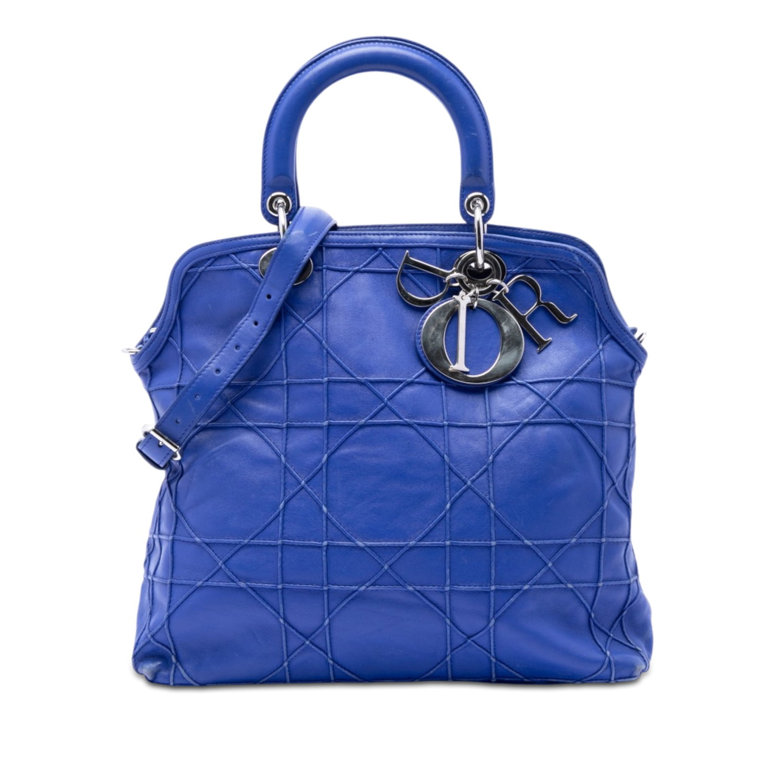 Dior Granville Cannage Blue Lambskin Satchel: Dior Granville Cannage Blue Lambskin Satchel This Dior Medium Lambskin Cannage Polochon Granville Satchel features a quilted lambskin leather body in blue, flat leather top handles, and a detachable, 