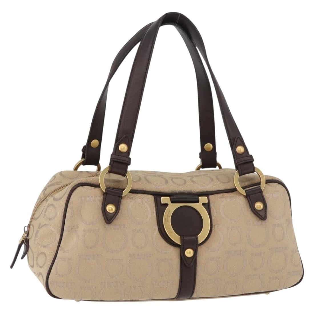 Salvatore Ferragamo Gancini beige gold canvas handbag Italy: Salvatore Ferragamo Gancini beige gold canvas handbag Italy This Salvatore Ferragamo Gancini handbag is crafted from beige and gold canvas and designed for women. Made in Italy, it features a structur