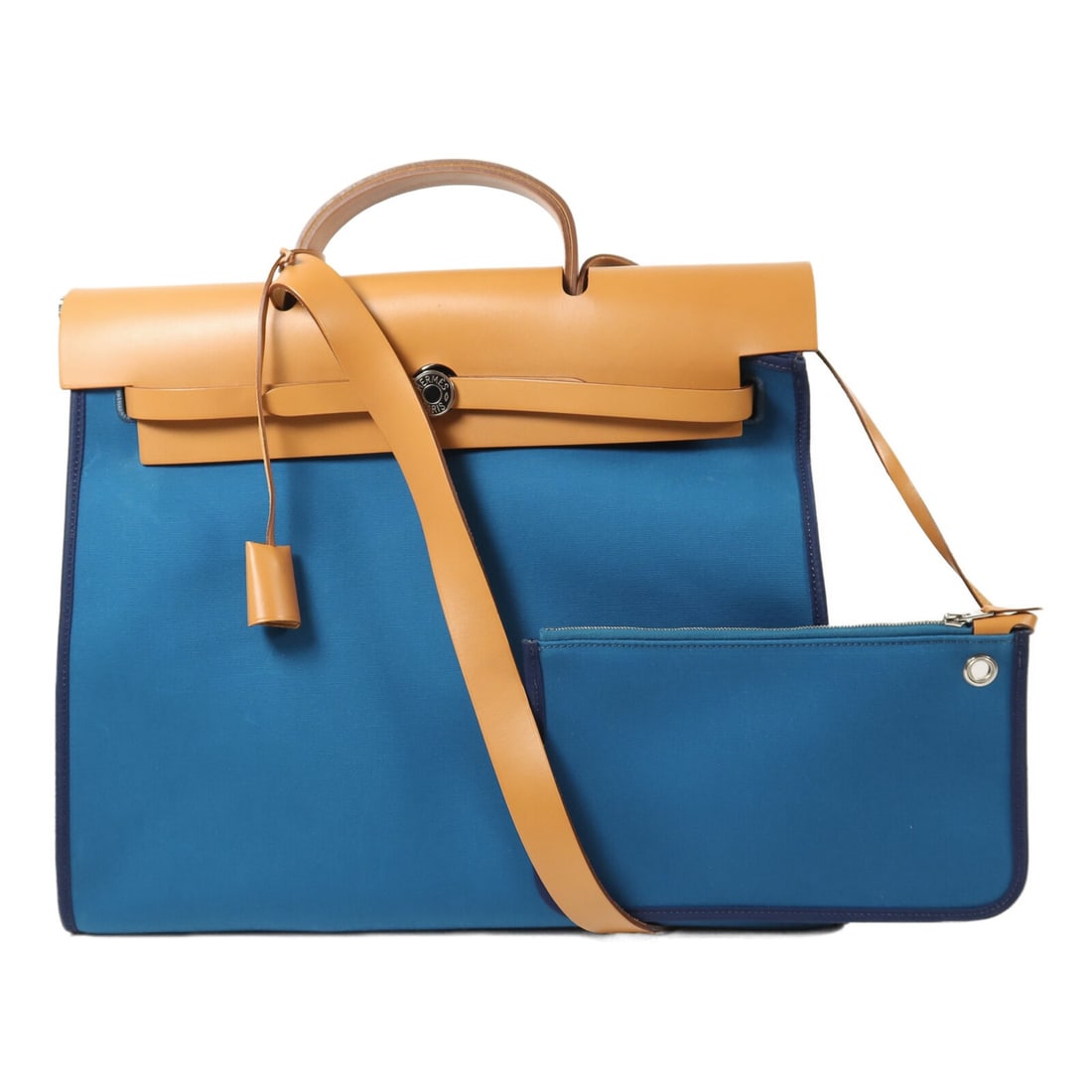 Hermes Herbag MM Blue Izmir Canvas 2 Way Shoulder Bag PHW: Hermes Herbag MM Blue Izmir Canvas 2 Way Shoulder Bag PHW Hermes Herbag MM 2 Way Shoulder Bag in canvas with a blue exterior color. This women's regular-size bag is made in France and features a blue 