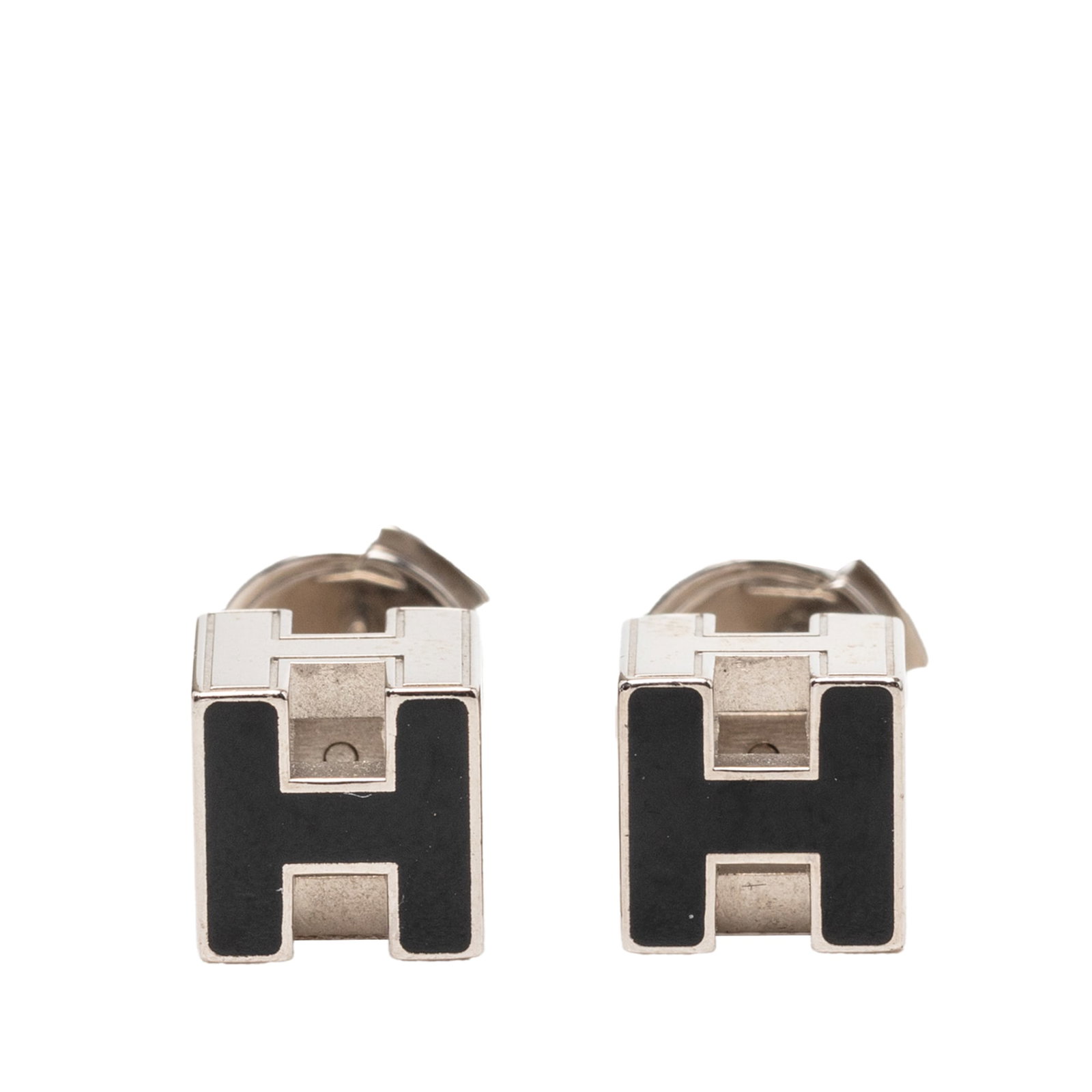 Hermes Cage D H Enamel Earrings with Palladium Plating: Hermes Cage D H Enamel Earrings with Palladium Plating A pair of Hermes push back earrings featuring a palladium plated metal body with enamel detailing. This costume jewelry design is made in France 