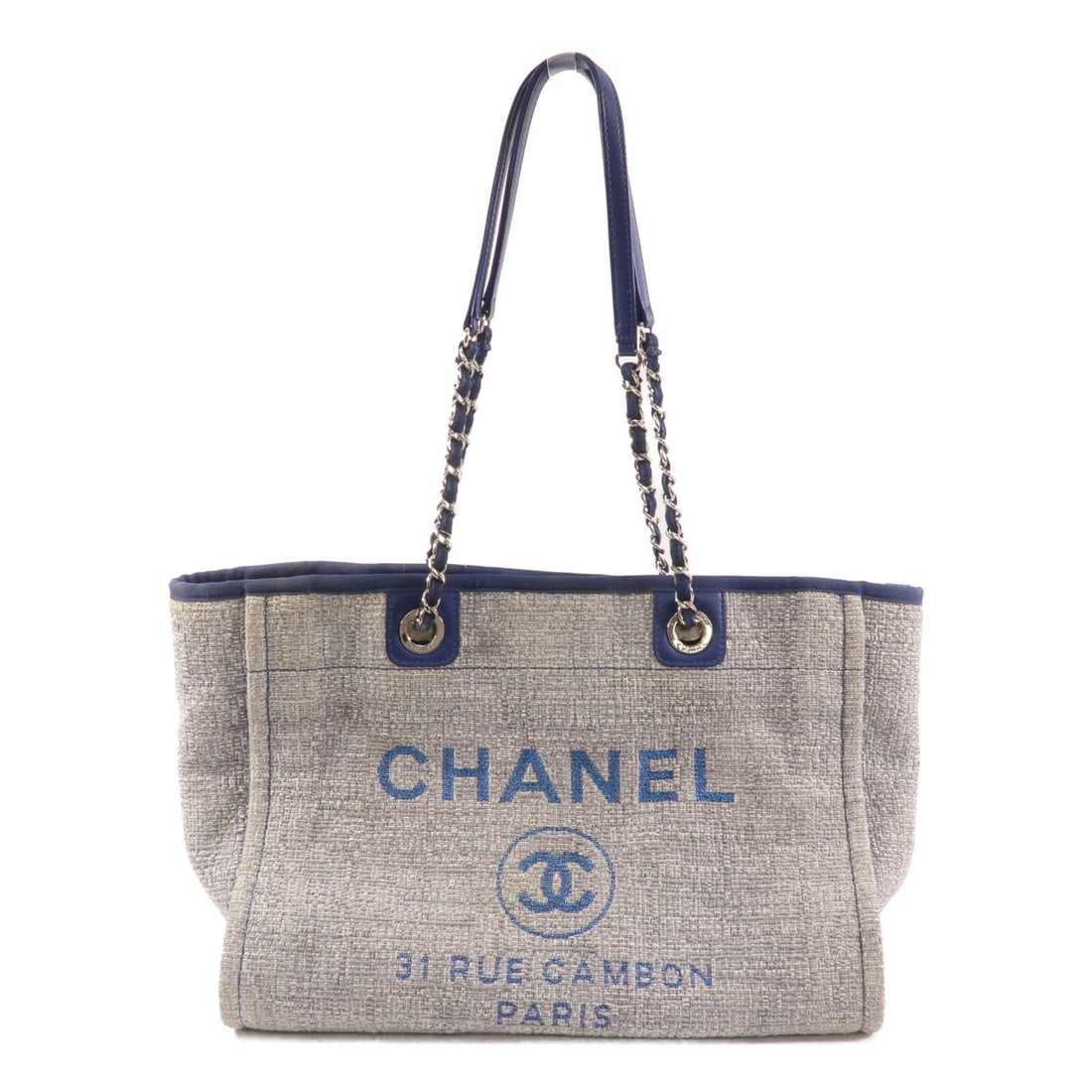 Chanel Deauville Blue Canvas Tote Bag with CC SHW: Chanel Deauville Blue Canvas Tote Bag with CC SHW CHANEL Deauville Tote Bag in blue canvas, designed for women and presented in a regular size. It features a tote bag style with a blue exterior and fr
