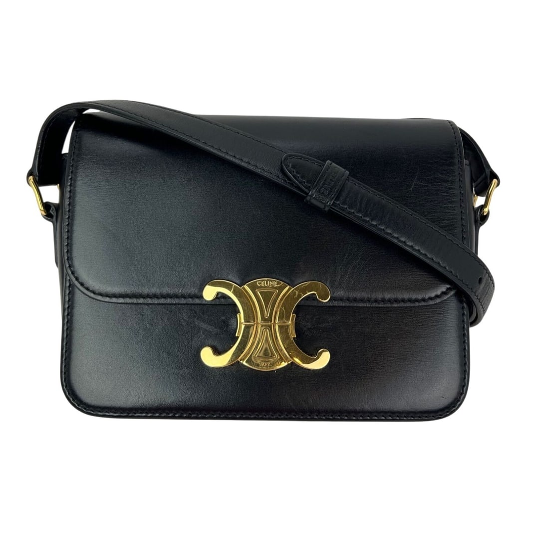 Celine Teen Triomphe Black Leather Shoulder Bag with Dust Bag: Celine Teen Triomphe Black Leather Shoulder Bag with Dust Bag Celine Teen Triomphe shoulder bag in shiny black calfskin with a rectangular shape and gold-tone hardware. It features a push lock closure