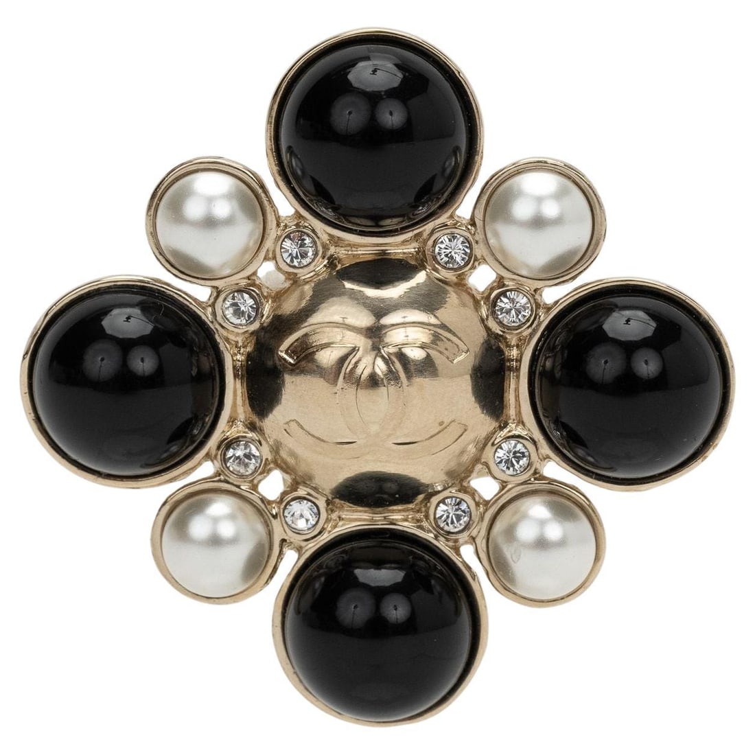 Chanel Maltese Cross Brooch with Pearls and Black Stones: Chanel Maltese Cross Brooch with Pearls and Black Stones Chanel Maltese cross pin featuring four pearls and four black stones arranged around a central CC logo. A distinctive fashion accessory from 20