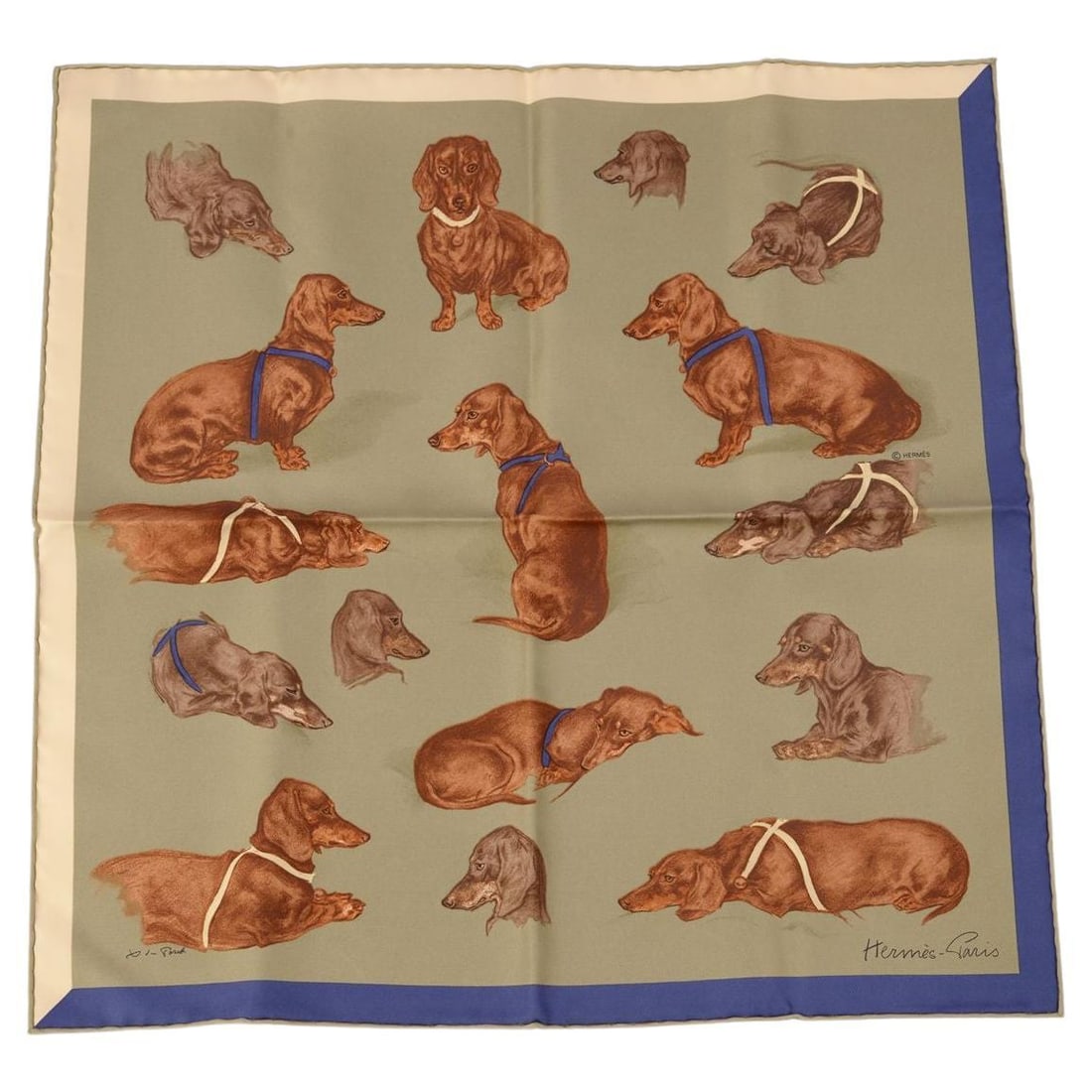 Hermes Les Bassets 100% Silk Gavroche Scarf: Hermes Les Bassets 100% Silk Gavroche Scarf This Hermes "Les Bassets" Gavroche scarf is crafted from 100% silk and features hand-rolled edges. Designed by Xavier de Poret, it showcases exquisite craft