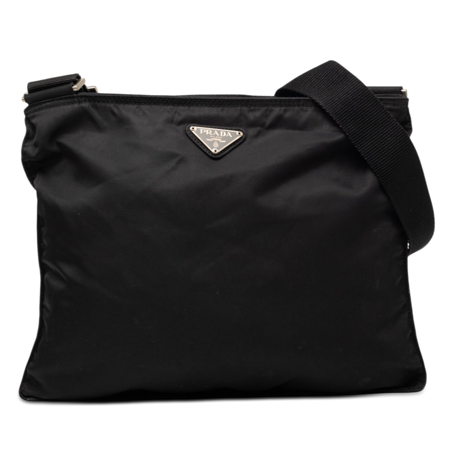 Prada Tessuto nylon crossbody bag with zip top black: Prada Tessuto nylon crossbody bag with zip top black Prada Tessuto Zip Top Crossbody bag in black, made with a nylon body and fabric material. It features an adjustable flat shoulder strap and a top z