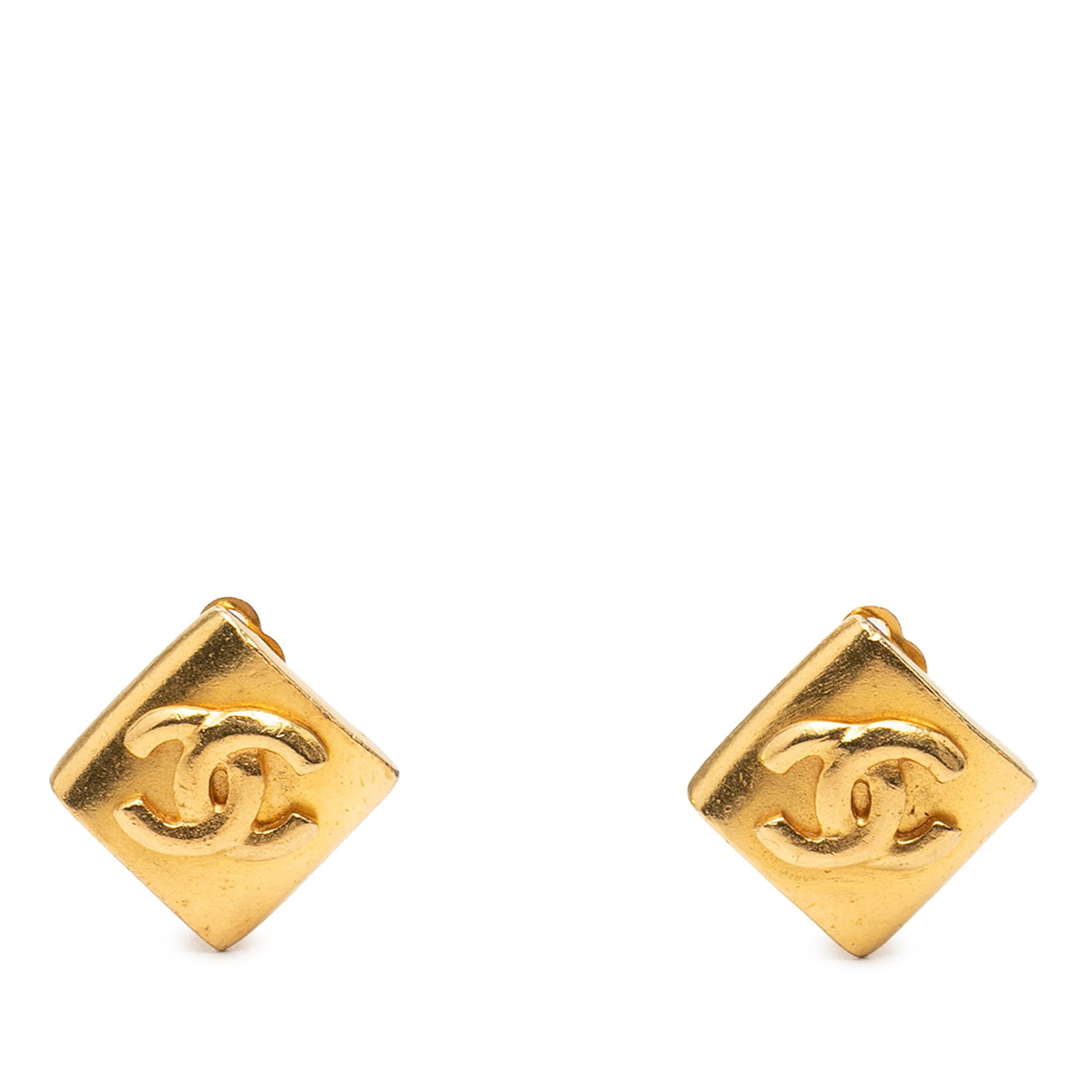 Chanel CC Rhombus Clip Earrings Gold Plated Metal: Chanel CC Rhombus Clip Earrings Gold Plated Metal Chanel CC rhombus clip-on earrings in gold-plated metal. This costume jewelry pair is made in France and features the iconic CC motif with a clip-on c