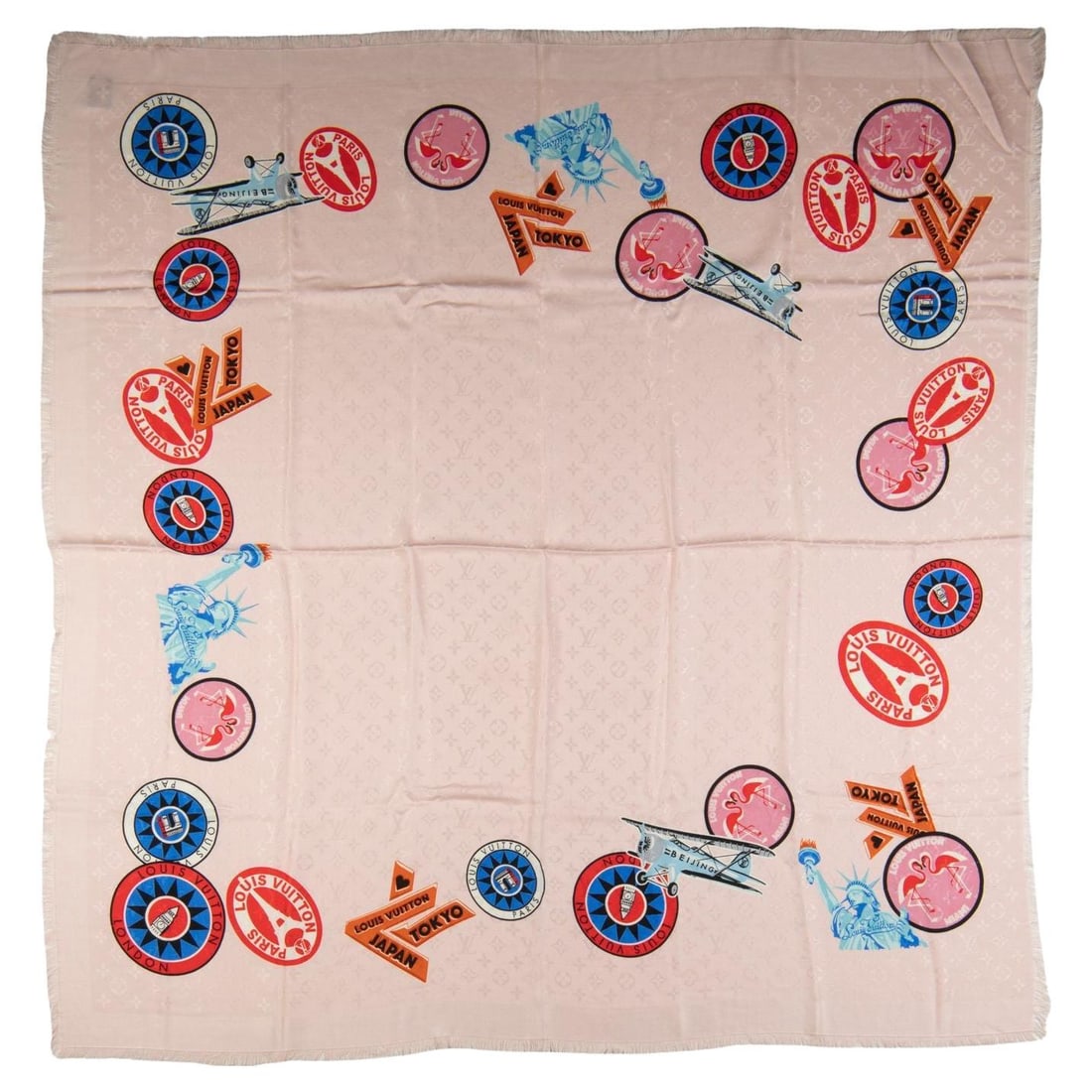 Louis Vuitton Monogram World Tour silk wool shawl nude: Louis Vuitton Monogram World Tour silk wool shawl nude Limited edition Monogram World Tour shawl in nude with a tonal design. Made from a silk and wool blend, this piece shows a pulled thread as noted