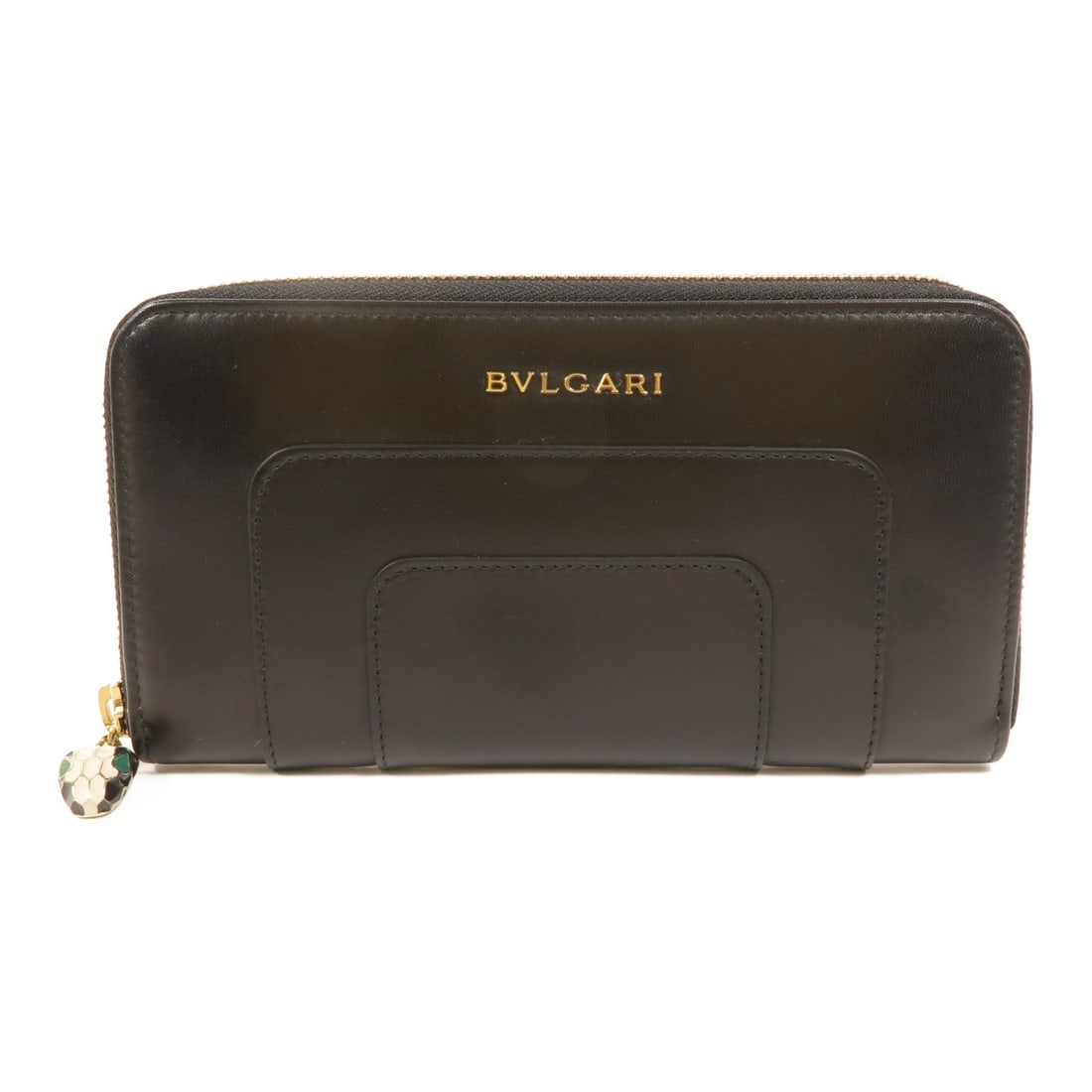 BVLGARI calfskin long wallet black leather: BVLGARI calfskin long wallet black leather A BVLGARI long wallet in black calfskin leather with a black-on-black color presentation. It features a fastener closure, two open pockets, eight card slots,