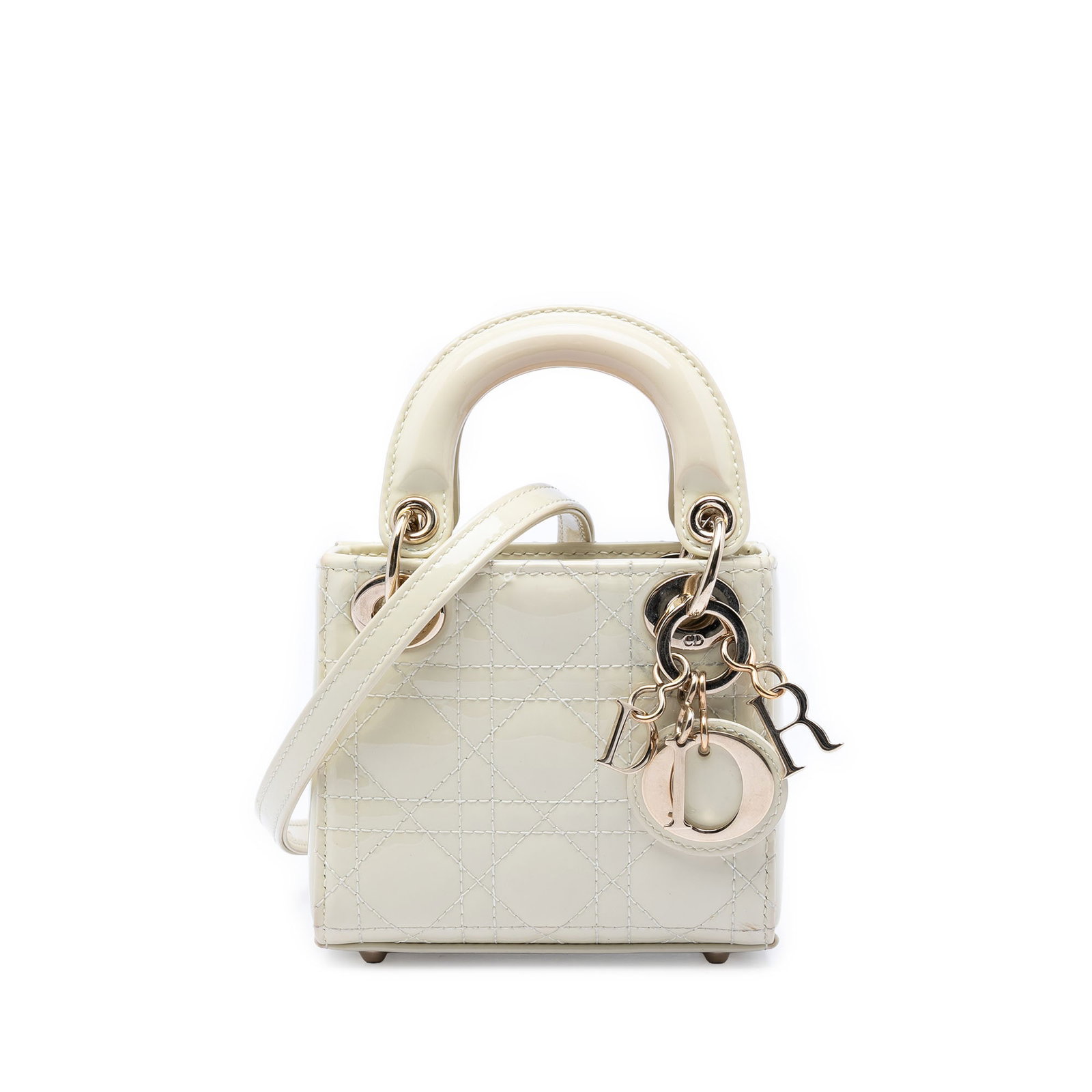 Dior Lady Dior Micro Cannage Patent Leather Bag White: Dior Lady Dior Micro Cannage Patent Leather Bag White A Micro Patent Cannage Lady Dior bag in white patent leather, made in Italy. It features the signature quilted Cannage body, flat top handles, a d