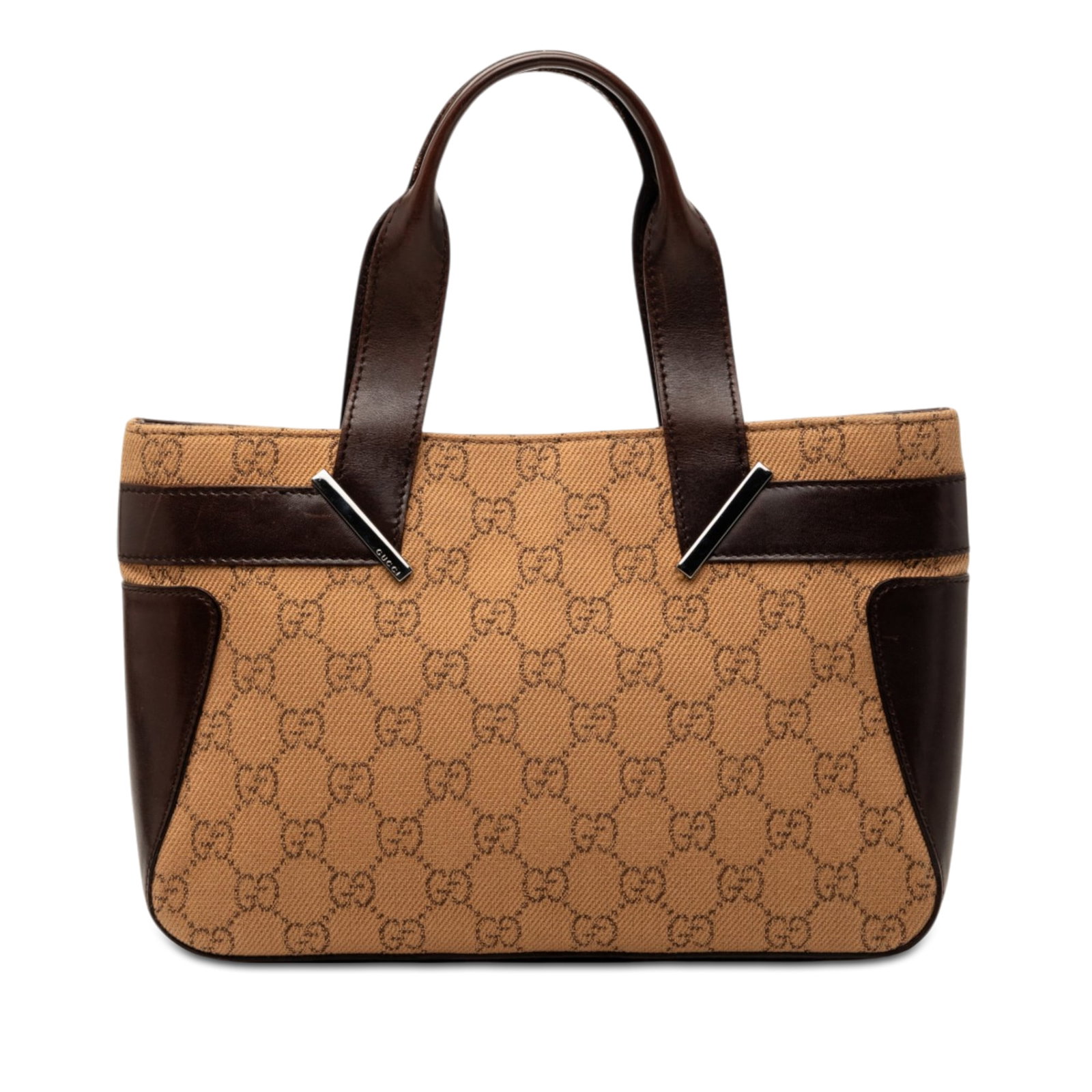 Gucci Brown Denim Leather Trim Handbag: Gucci Brown Denim Leather Trim Handbag This Gucci GG Denim Handbag features a denim body with leather trim, flat leather handles, an open top with magnetic snap closure, and an interior zip pocket. Th