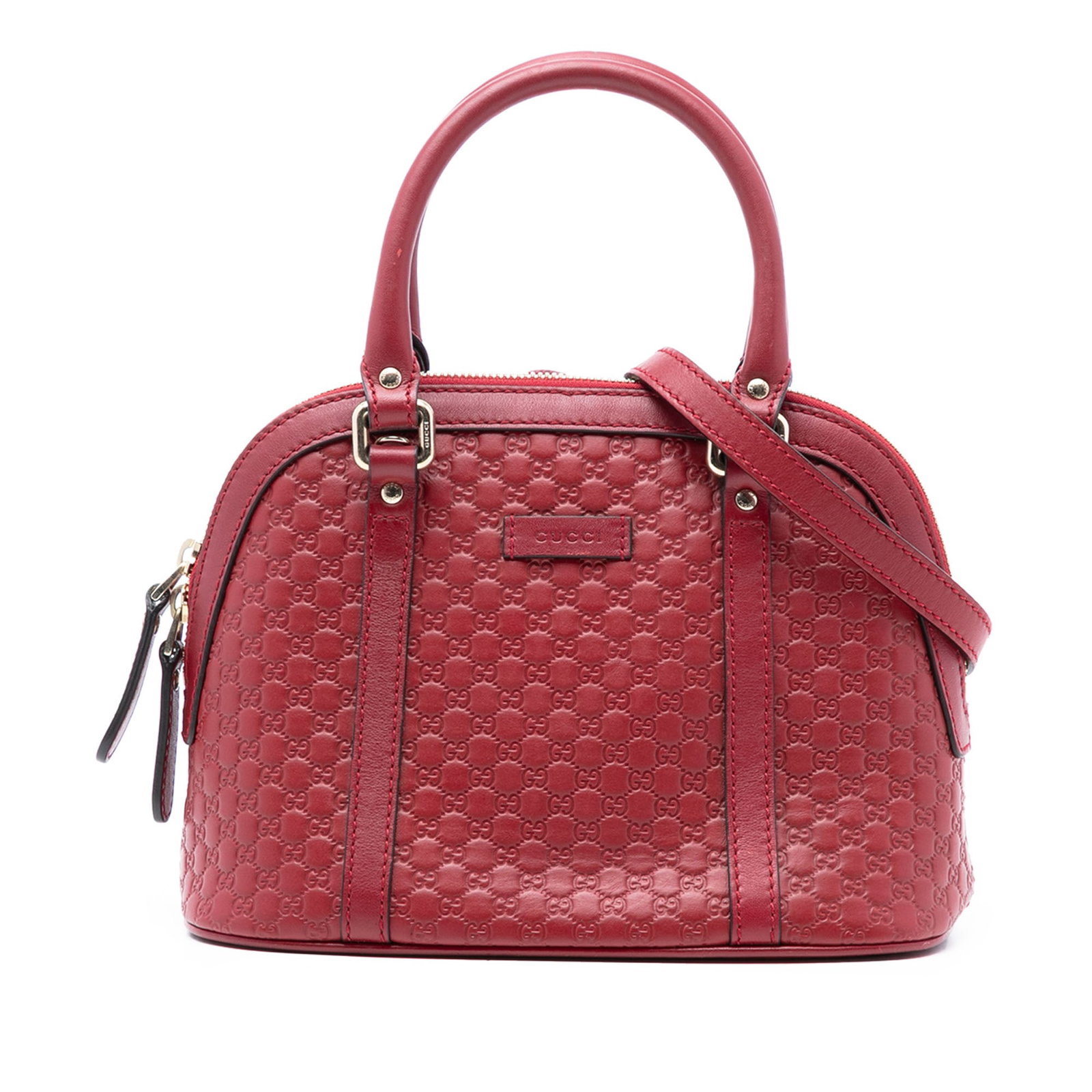 Gucci Mini Dome Satchel in Red Leather with Detachable Strap: Gucci Mini Dome Satchel in Red Leather with Detachable Strap This Gucci Mini Microguccissima Dome Satchel features a red leather body with rolled leather handles and a detachable flat strap. It is des