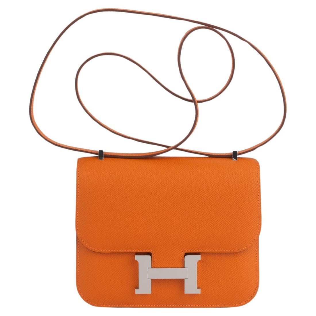 Hermes Mini Constance Handbag Orange Epsom Leather with Palladium H Logo: Hermes Mini Constance Handbag Orange Epsom Leather with Palladium H Logo Introducing the exquisite Hermes Mini Constance Handbag in a vibrant orange hue, meticulously crafted from luxurious epsom leat