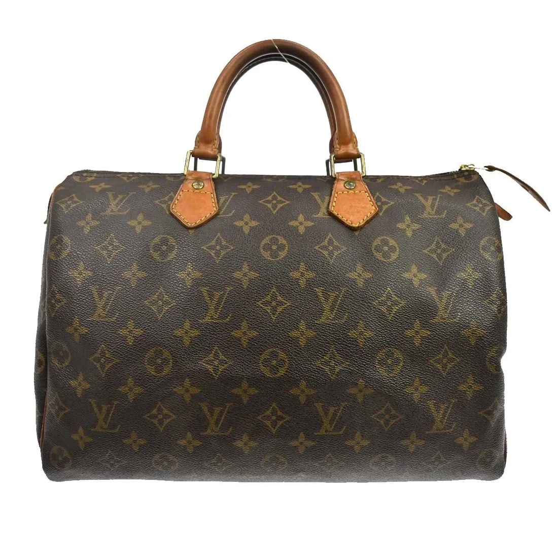 Louis Vuitton Speedy handbag in brown monogram canvas: Louis Vuitton Speedy handbag in brown monogram canvas This Louis Vuitton Speedy Handbag features the iconic monogram canvas in brown, designed for women. The bag is crafted from canvas and made in Fra