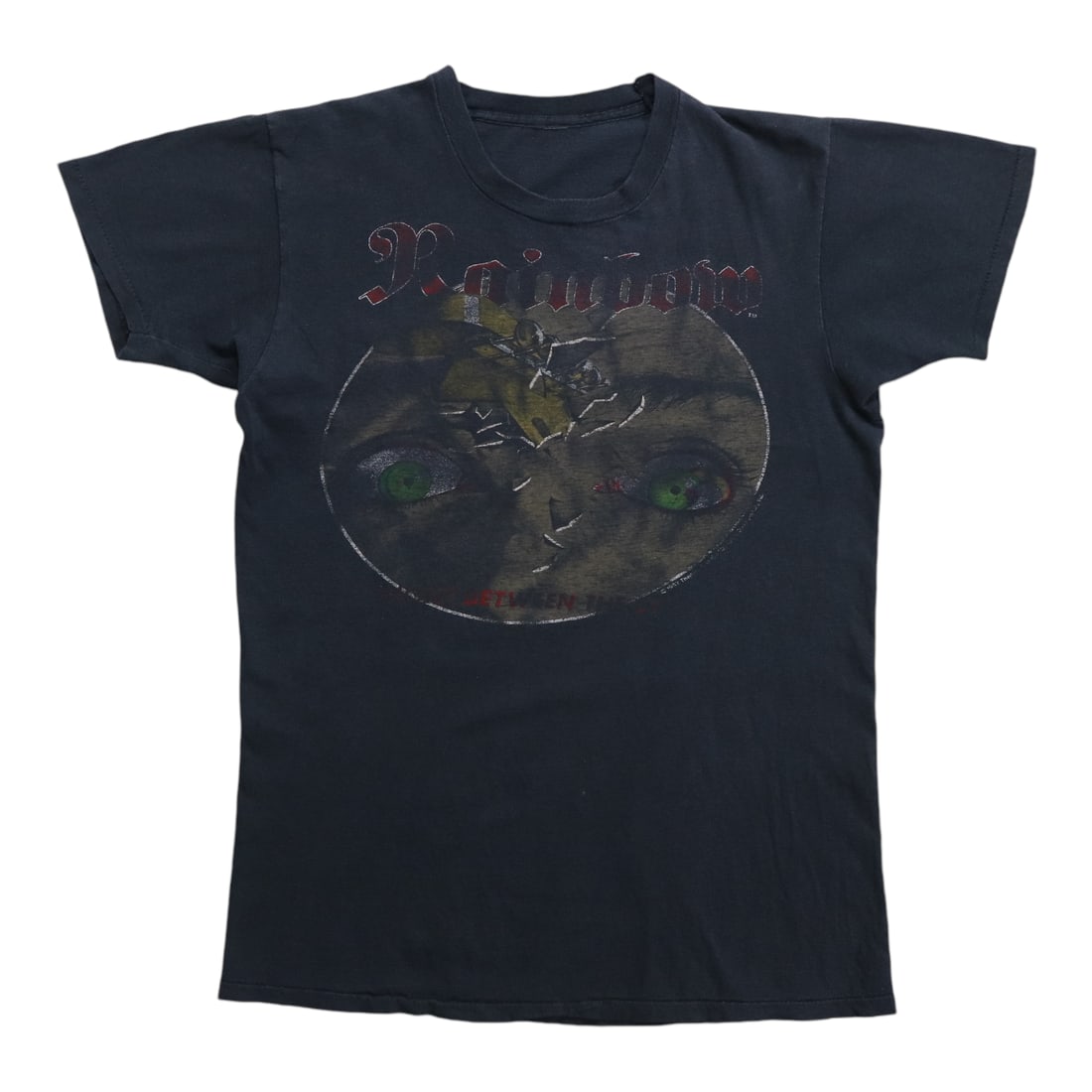 Vintage 1982 Rainbow Tour Black Cotton Concert T Shirt: Vintage 1982 Rainbow Tour Black Cotton Concert T Shirt This is an original vintage 1982 Rainbow World Tour shirt featuring front and back graphics. The shirt is made from 100% cotton in black and date