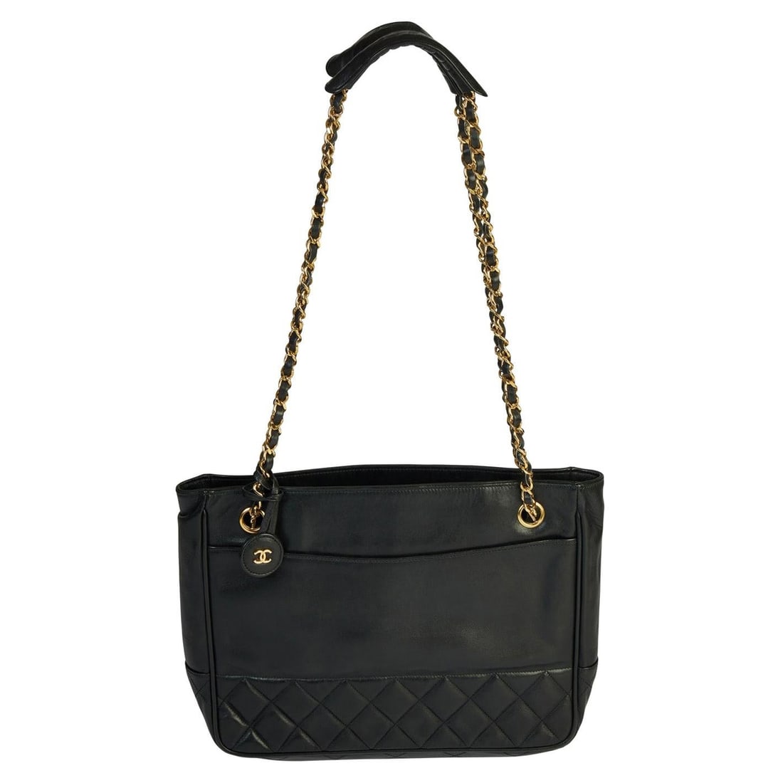 Chanel medium shoulder bag black leather chain strap 1980s: Chanel medium shoulder bag black leather chain strap 1980s Vintage Chanel medium shoulder bag in black leather with a partially quilted design and gold tone hardware. This 1980s piece is from the 1986
