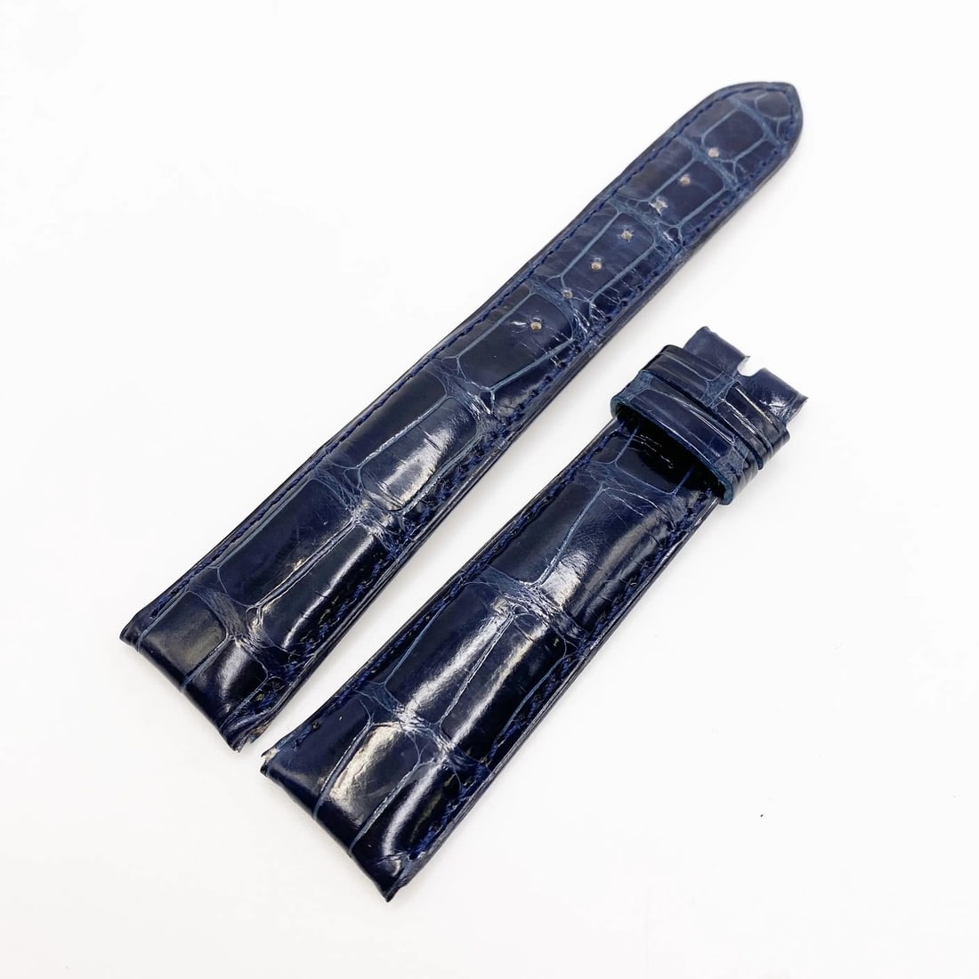 Chopard Blue Leather Watch Strap 20mm to 16mm for Tang Buckle: Chopard Blue Leather Watch Strap 20mm to 16mm for Tang Buckle This is an authentic Chopard blue leather band designed for use with a tang buckle. It features a 20mm width at the lug and tapers to 16mm