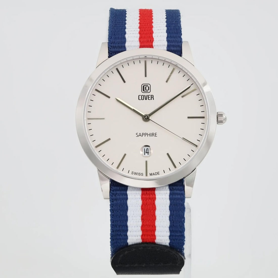 COVER 38mm Stainless Steel Quartz Watch with White Dial and Gray Bezel: COVER 38mm Stainless Steel Quartz Watch with White Dial and Gray Bezel Discover the elegance of this 38mm stainless steel wristwatch by COVER, featuring a classic white dial with stick indexes and an 
