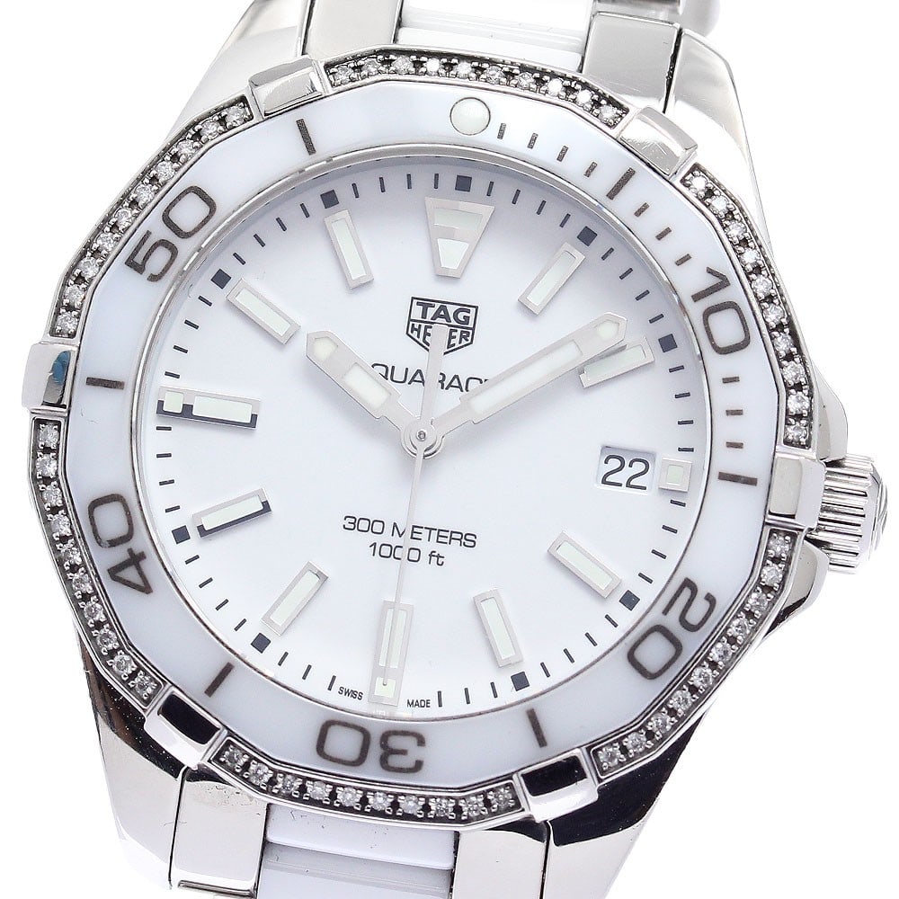 TAG HEUER Aquaracer WAY131H women's quartz watch diamond bezel: TAG HEUER Aquaracer WAY131H women's quartz watch diamond bezel TAG Heuer Aquaracer women's wristwatch, reference WAY131H, with a diamond bezel, white dial, and quartz movement. This pre-owned Swiss wa