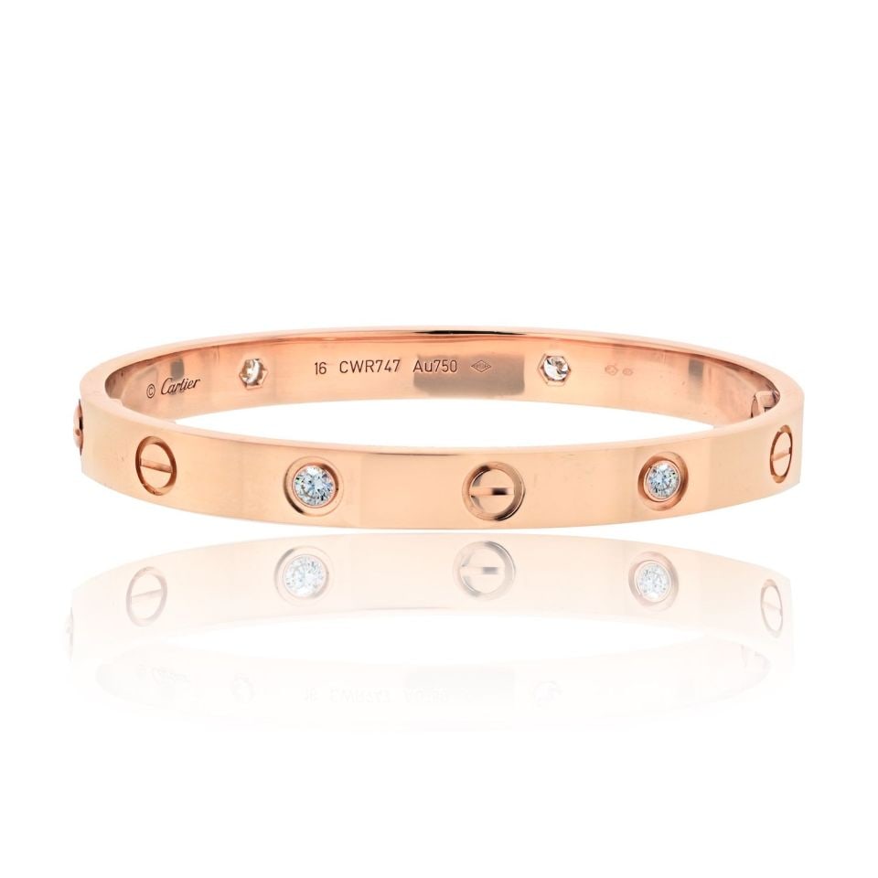 Cartier Love Bracelet 18K Rose Gold 4 Diamonds Authentic: Cartier Love Bracelet 18K Rose Gold 4 Diamonds Authentic The Cartier Love 18K Rose Gold 4 Diamond Bracelet is a stunning blend of luxury and elegance. Crafted in 18K rose gold, this exquisite piece fe